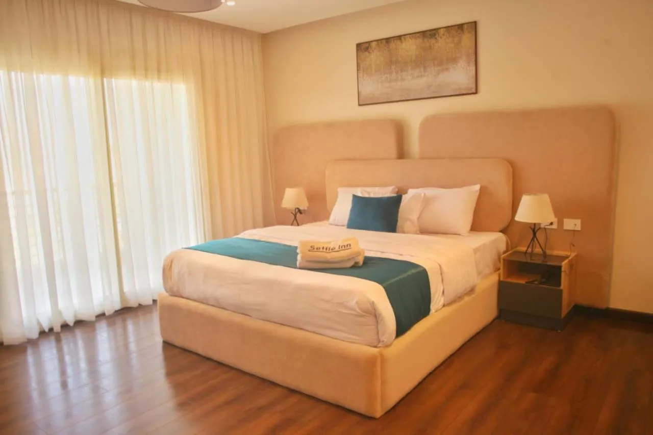 Bed in Settle Inn Cairo Festival City Villa