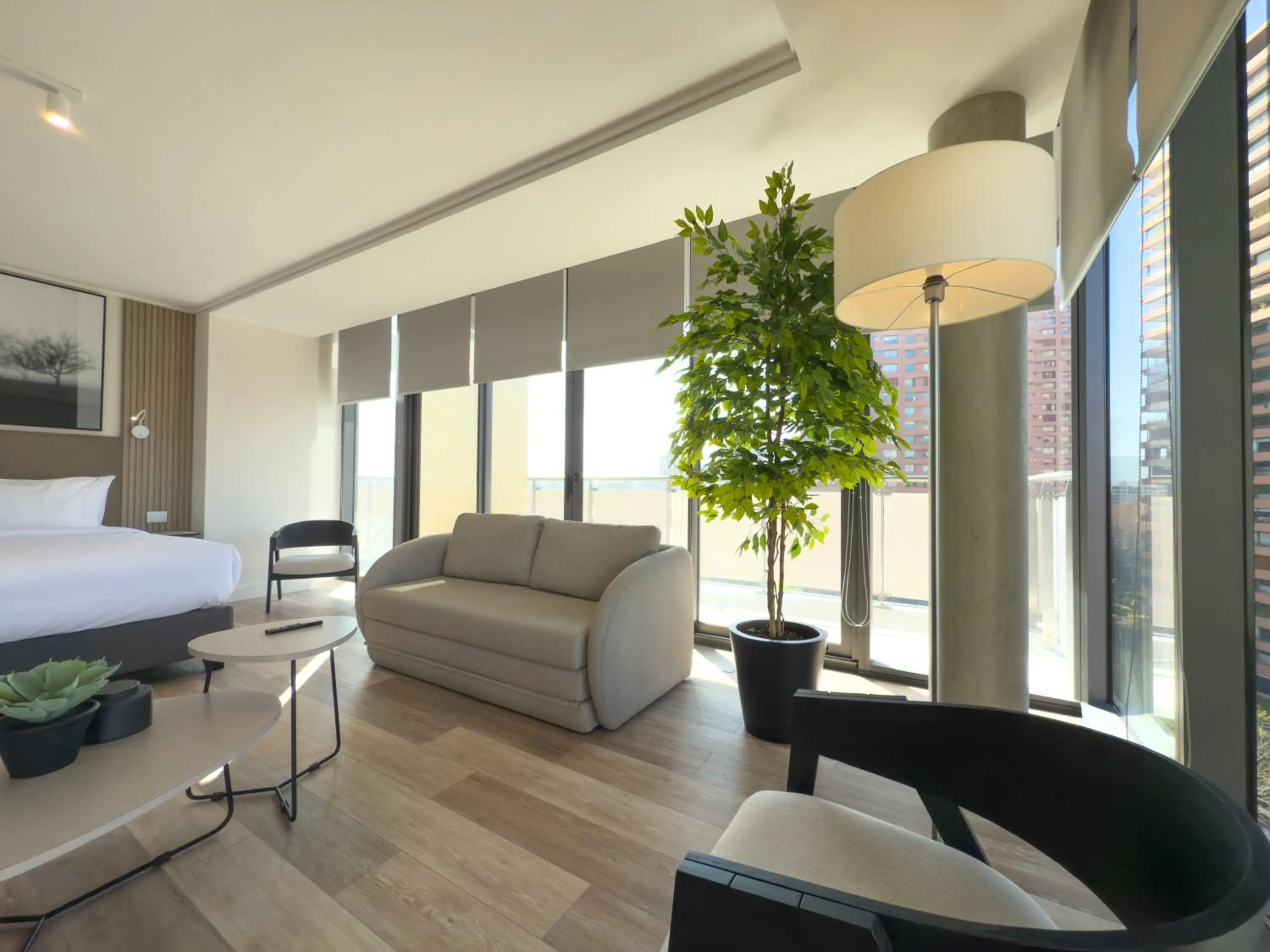 Living room, Bed in Spot Suites