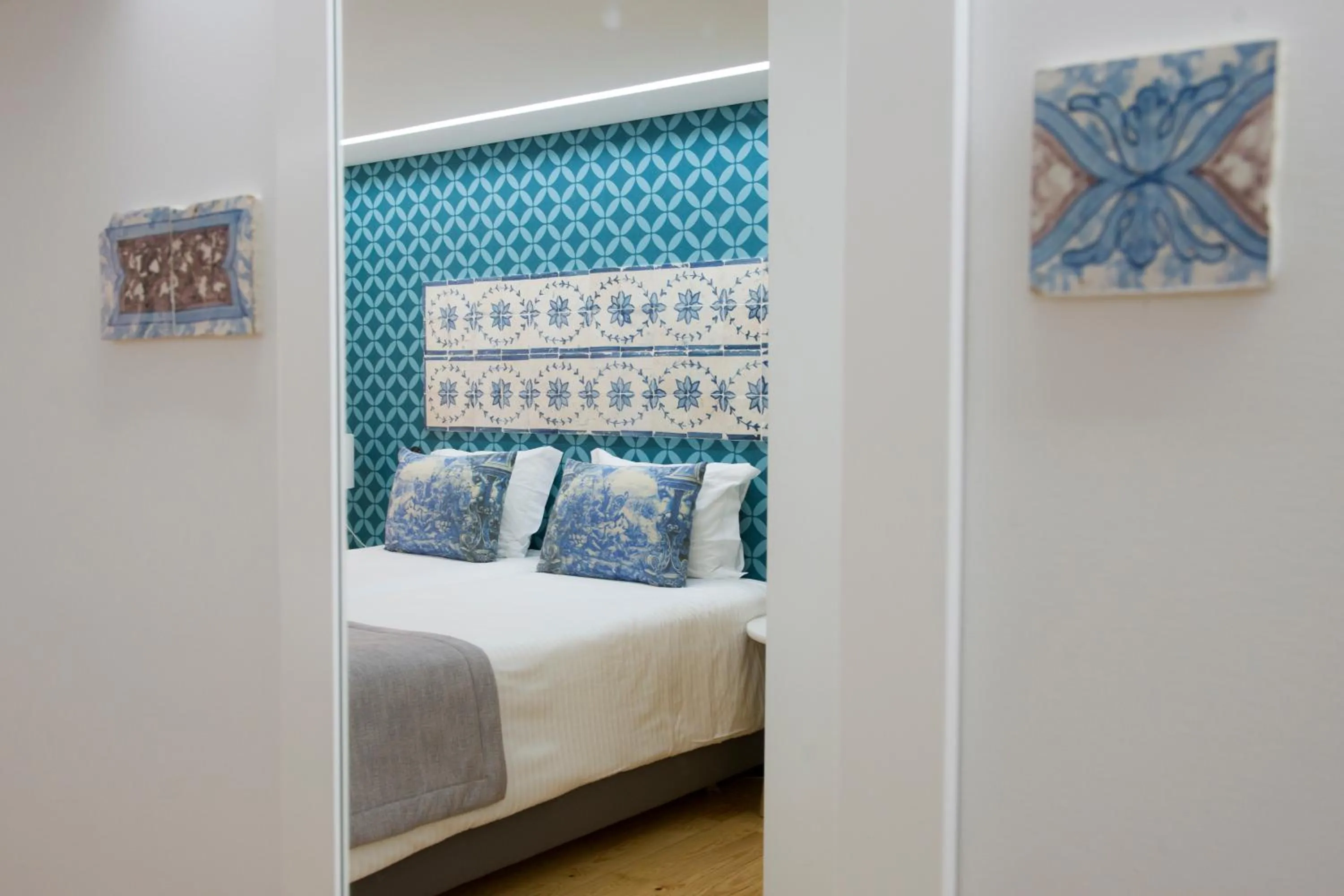 Decorative detail, Bed in Páteo Saudade Lofts