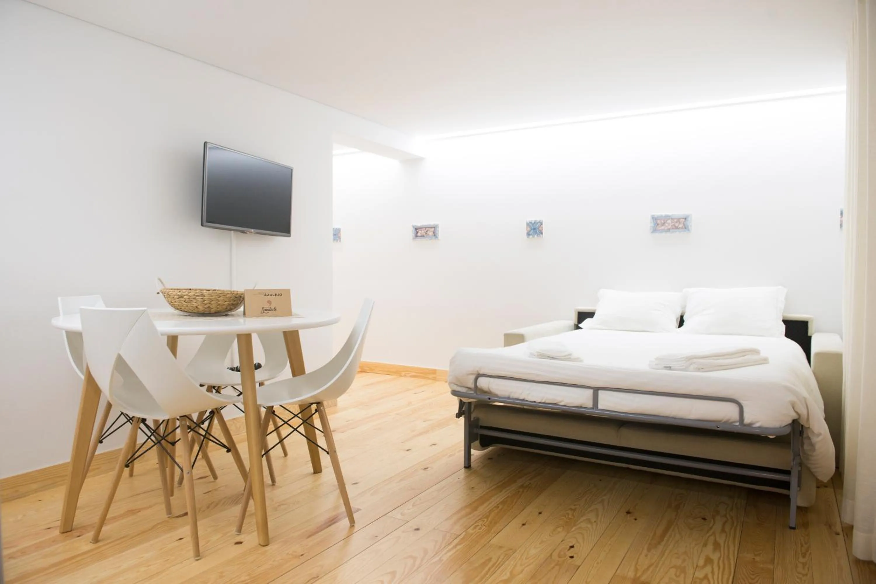 Bed in Páteo Saudade Lofts