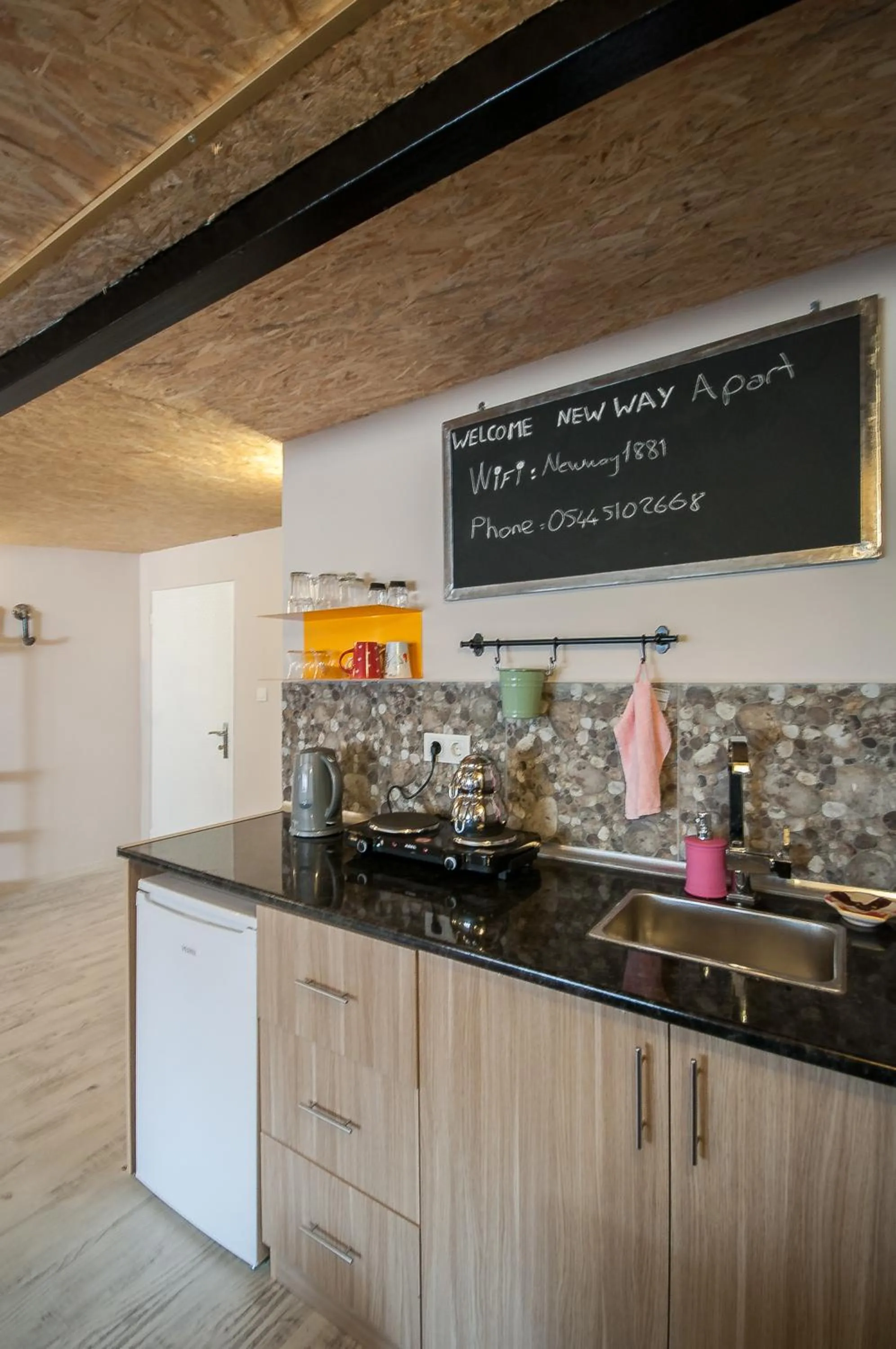 Kitchen or kitchenette in Newway Apartments