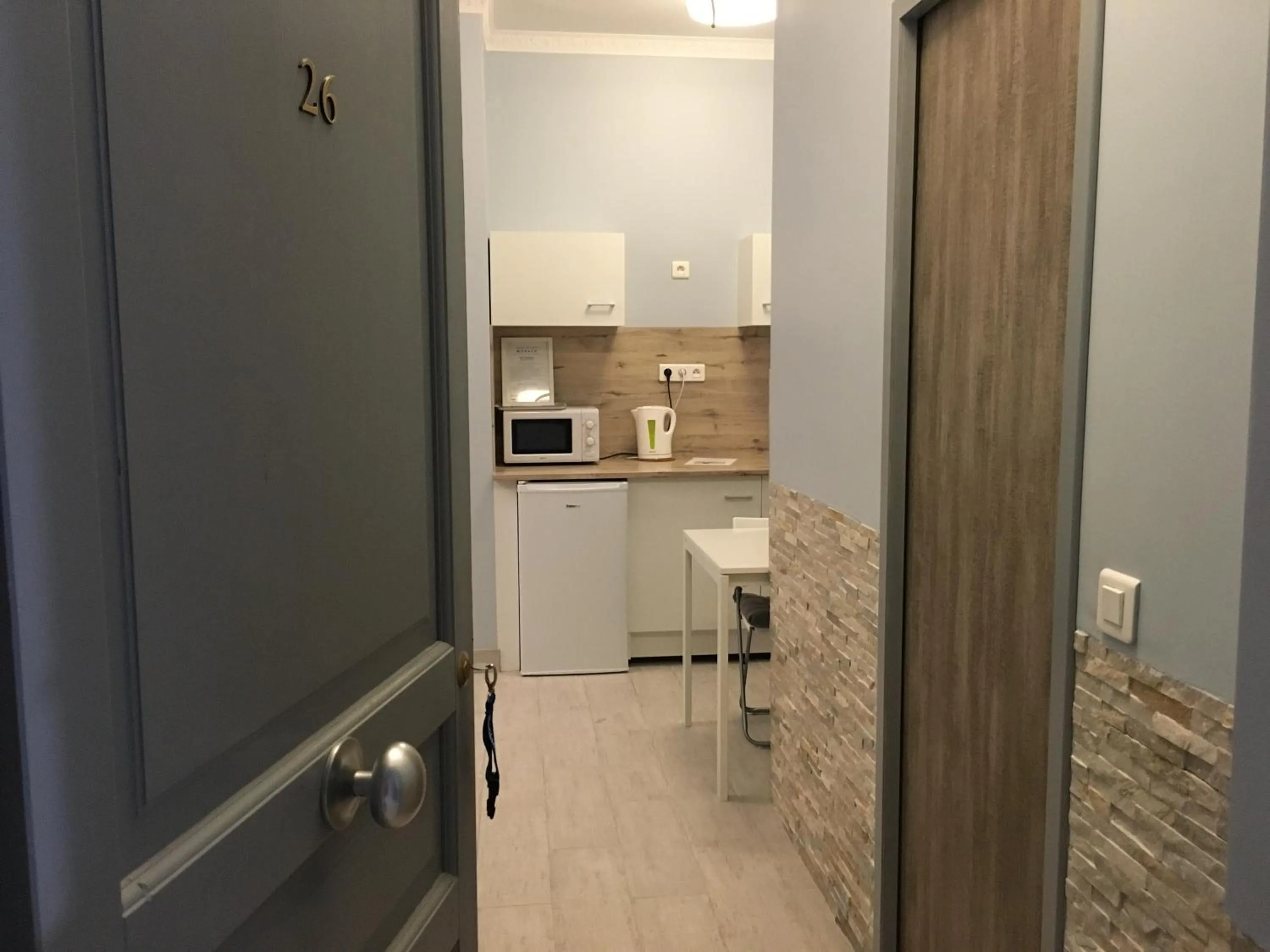 Kitchen or kitchenette in Apartments Monaco