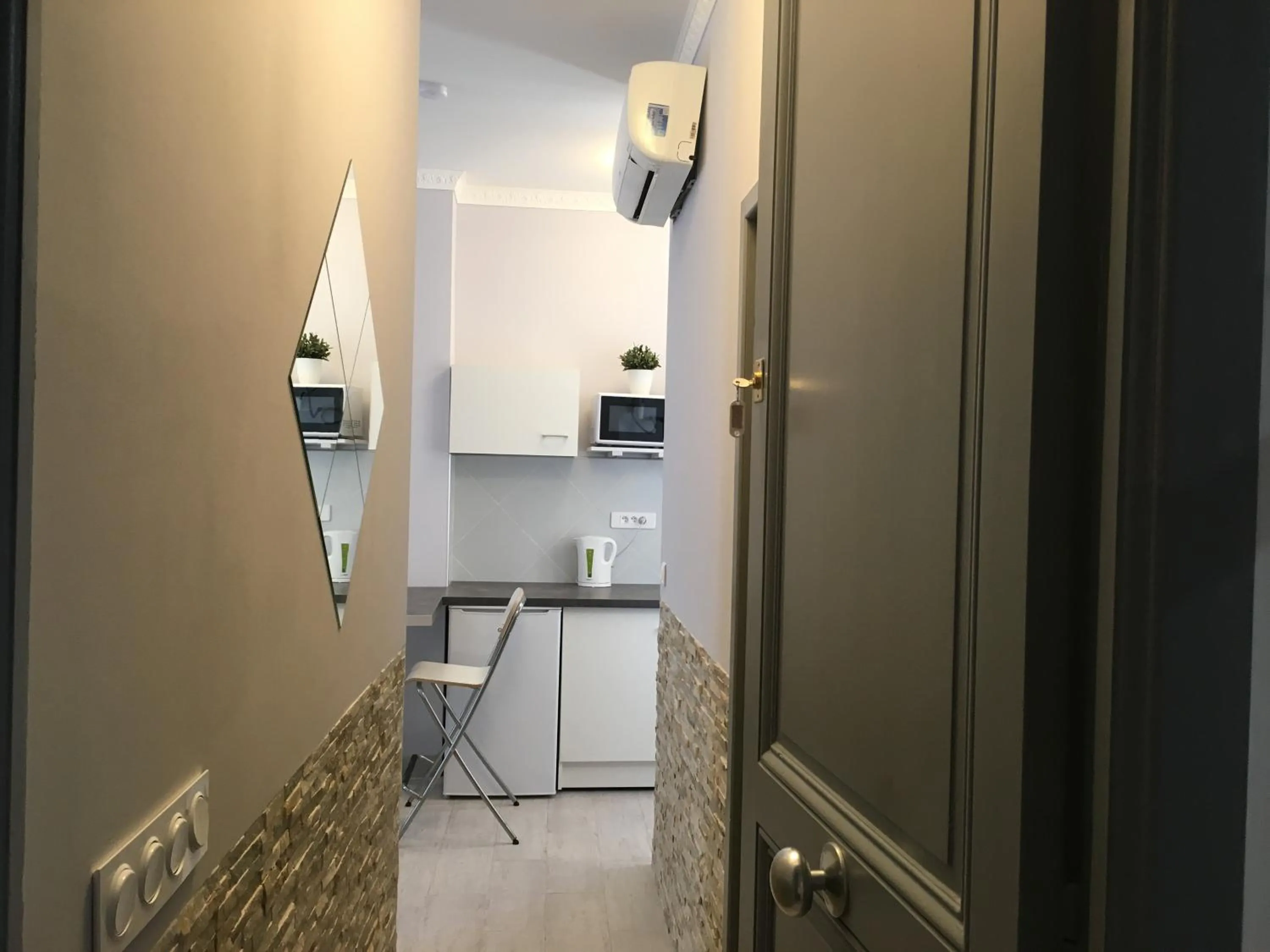 Kitchen or kitchenette in Apartments Monaco