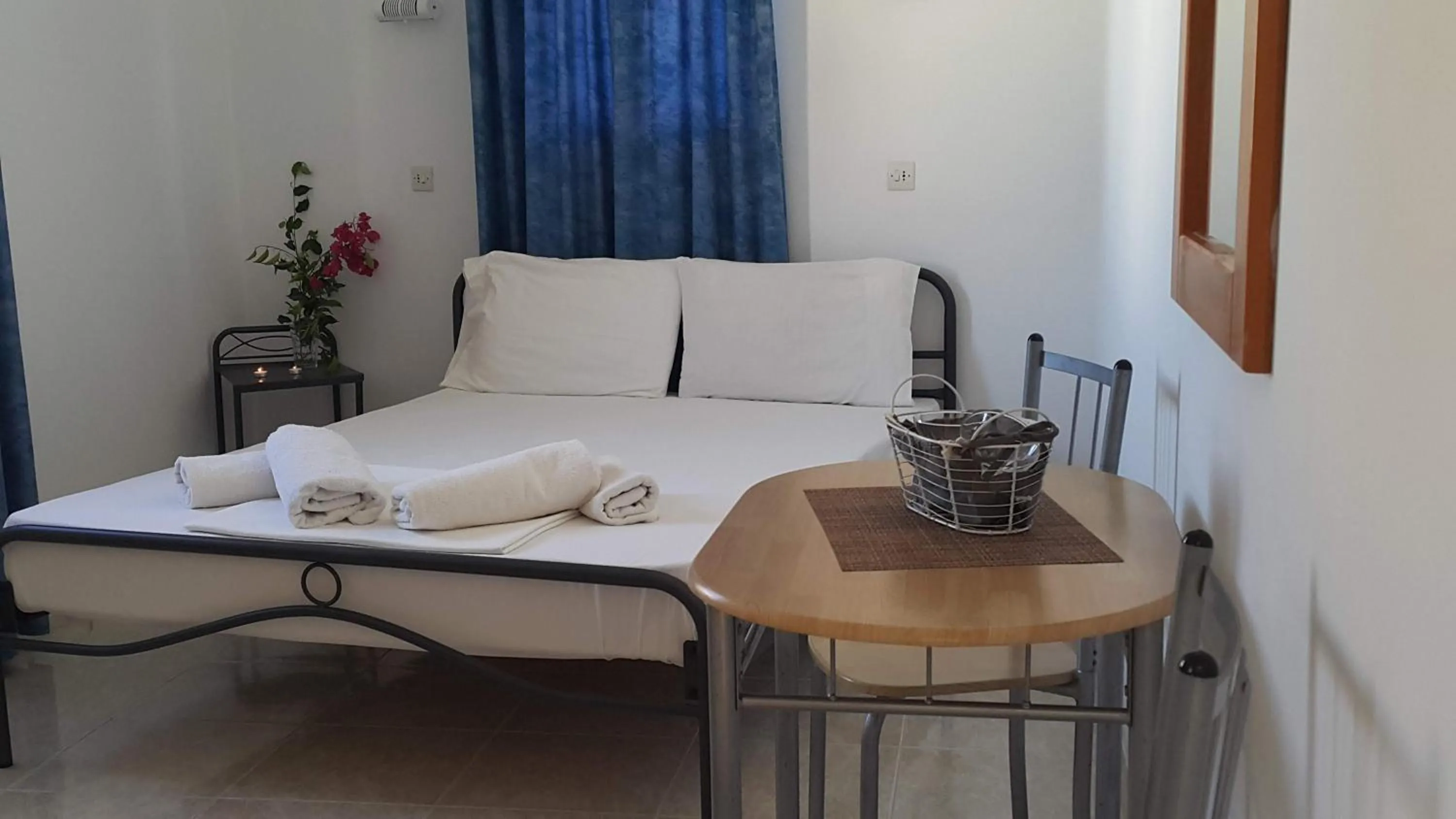 Photo of the whole room, Bed in Lindos Center Studios