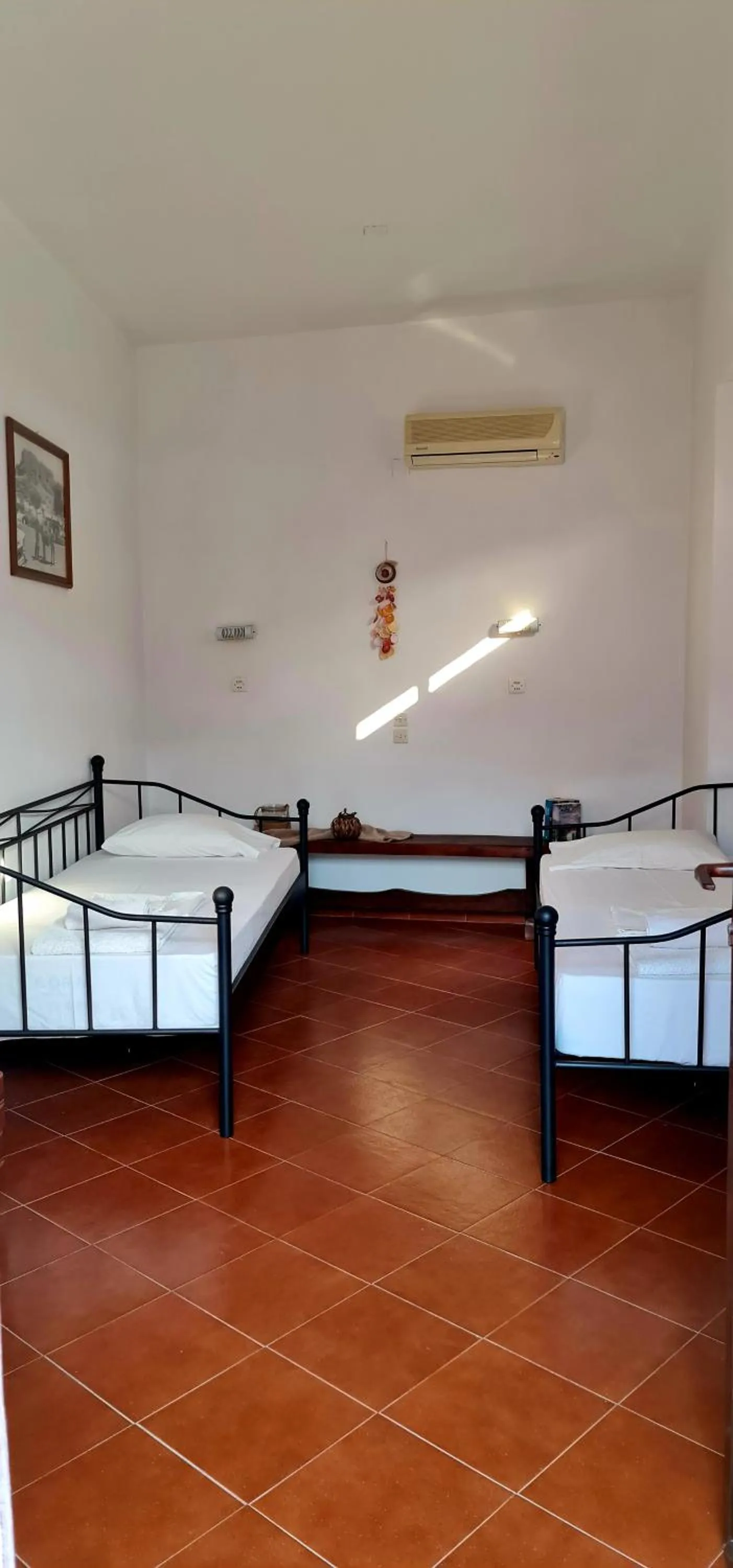 Property building, Bed in Lindos Center Studios