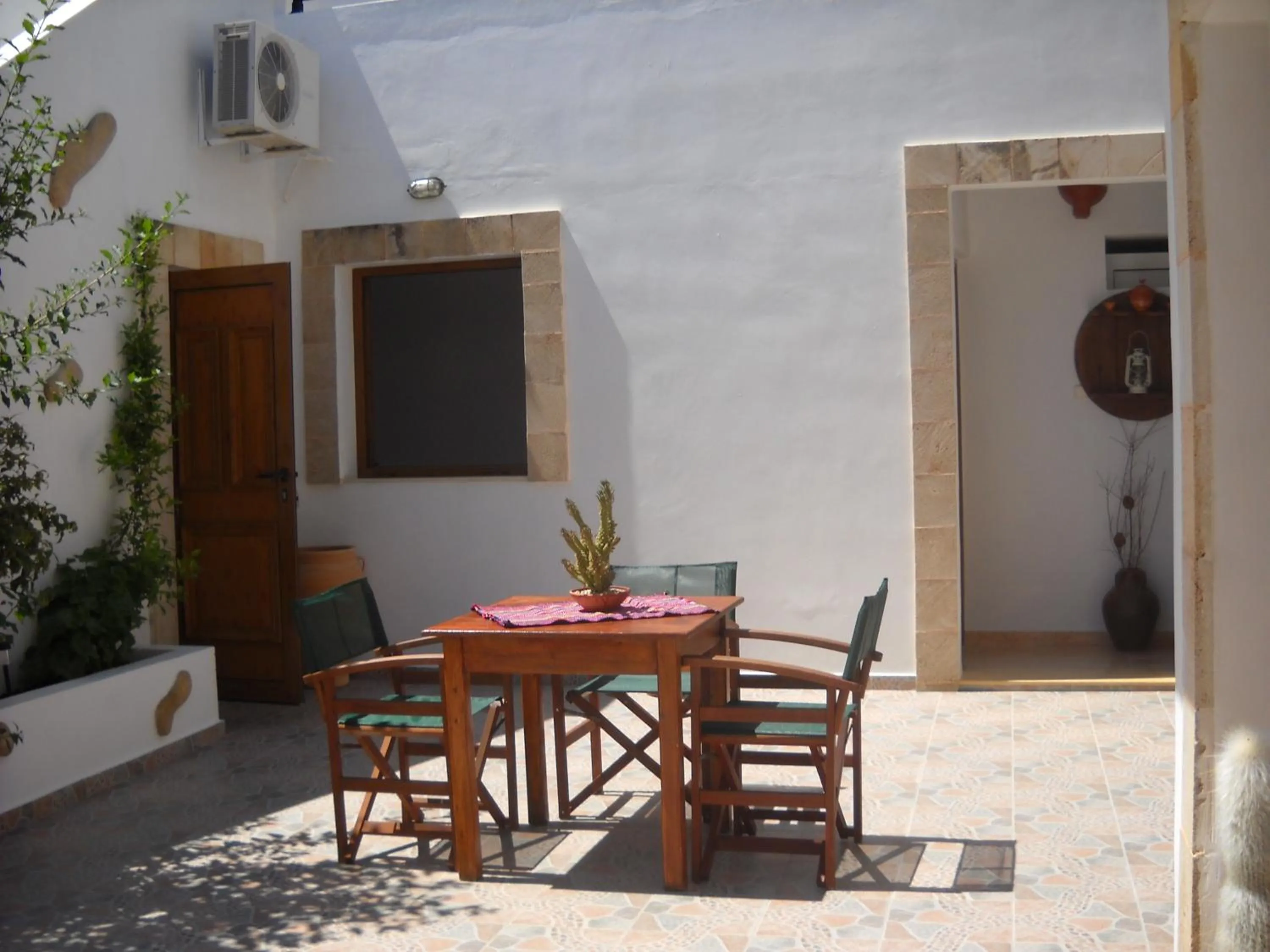 Facade/entrance in Lindos Center Studios