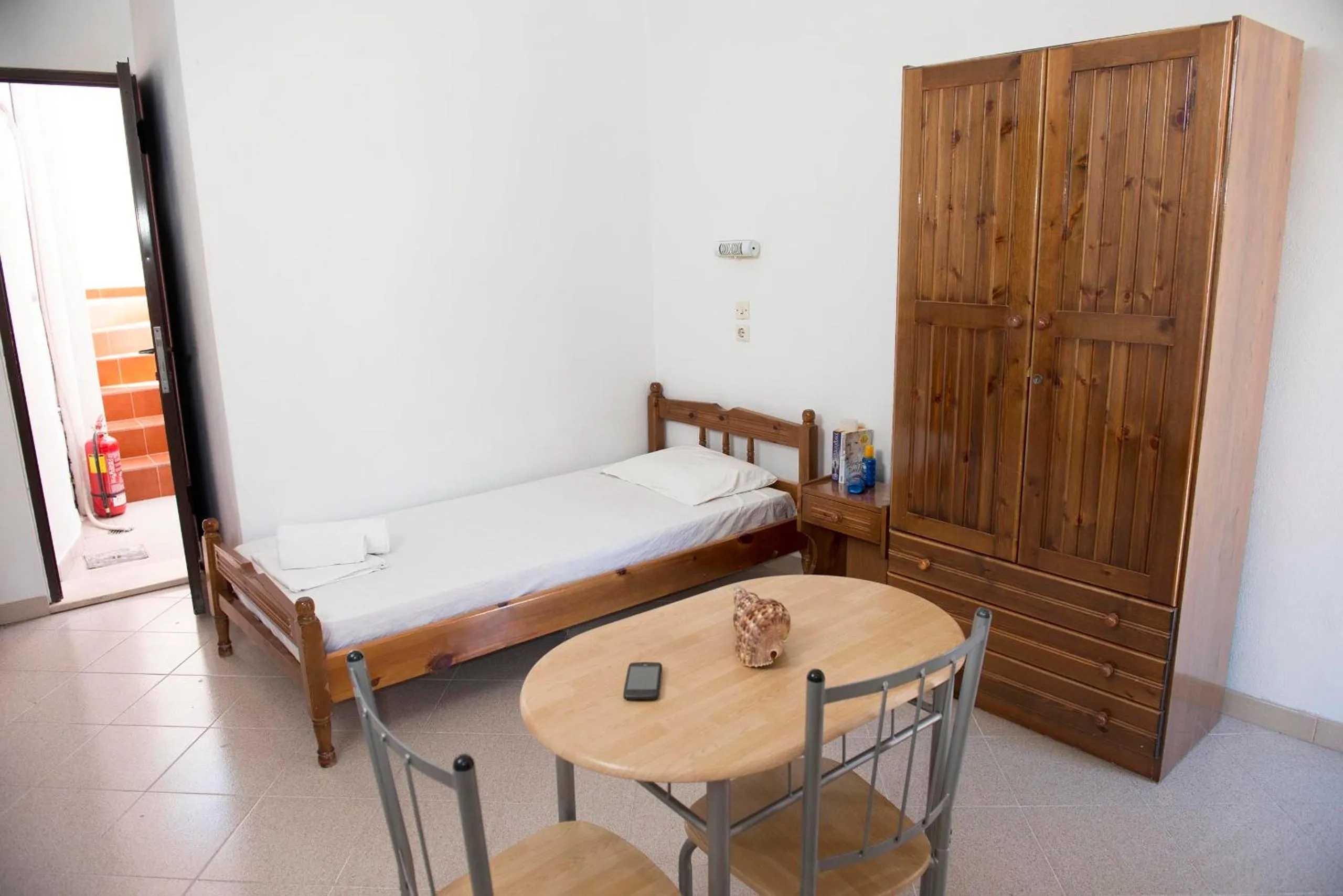 Photo of the whole room, Bed in Lindos Center Studios
