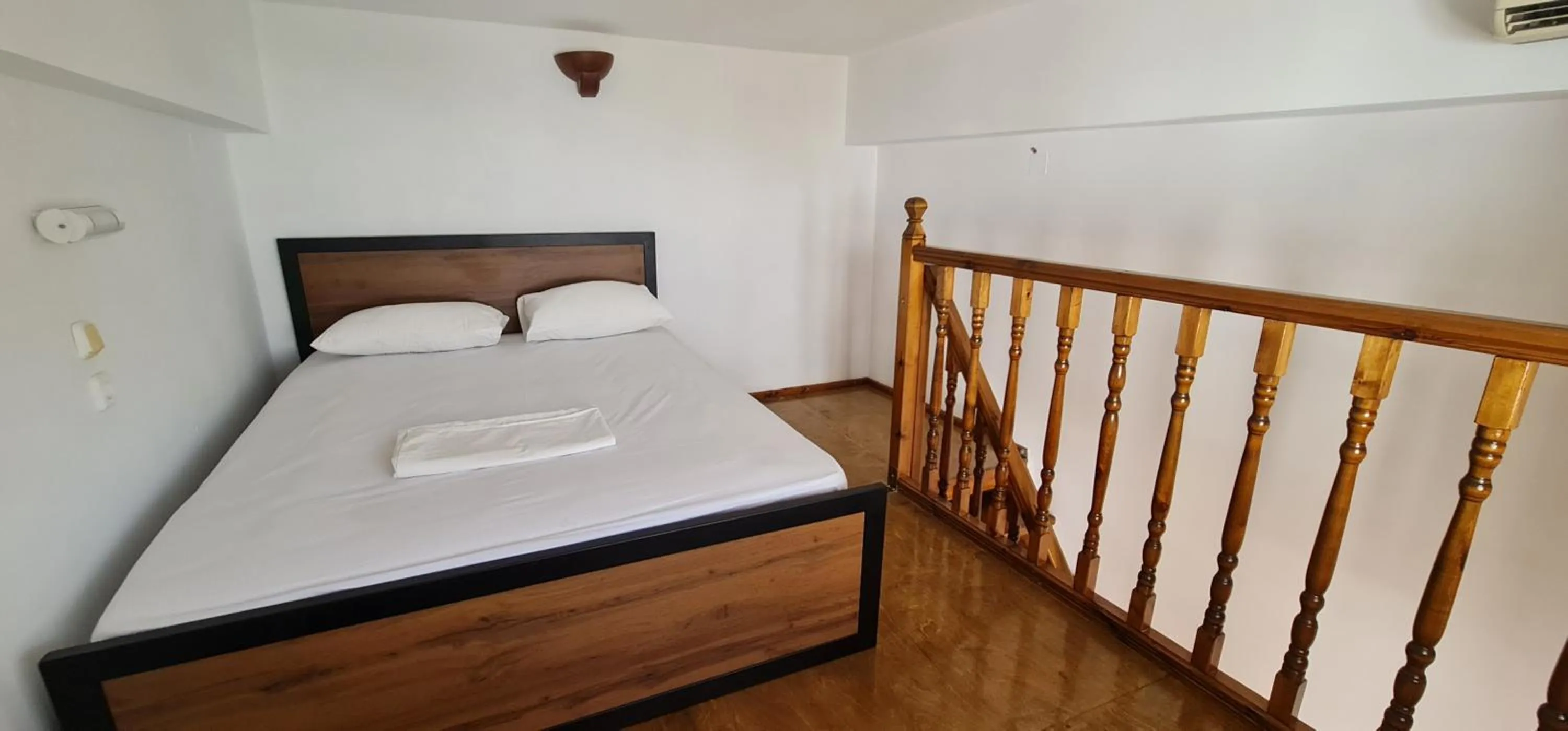Property building, Bed in Lindos Center Studios