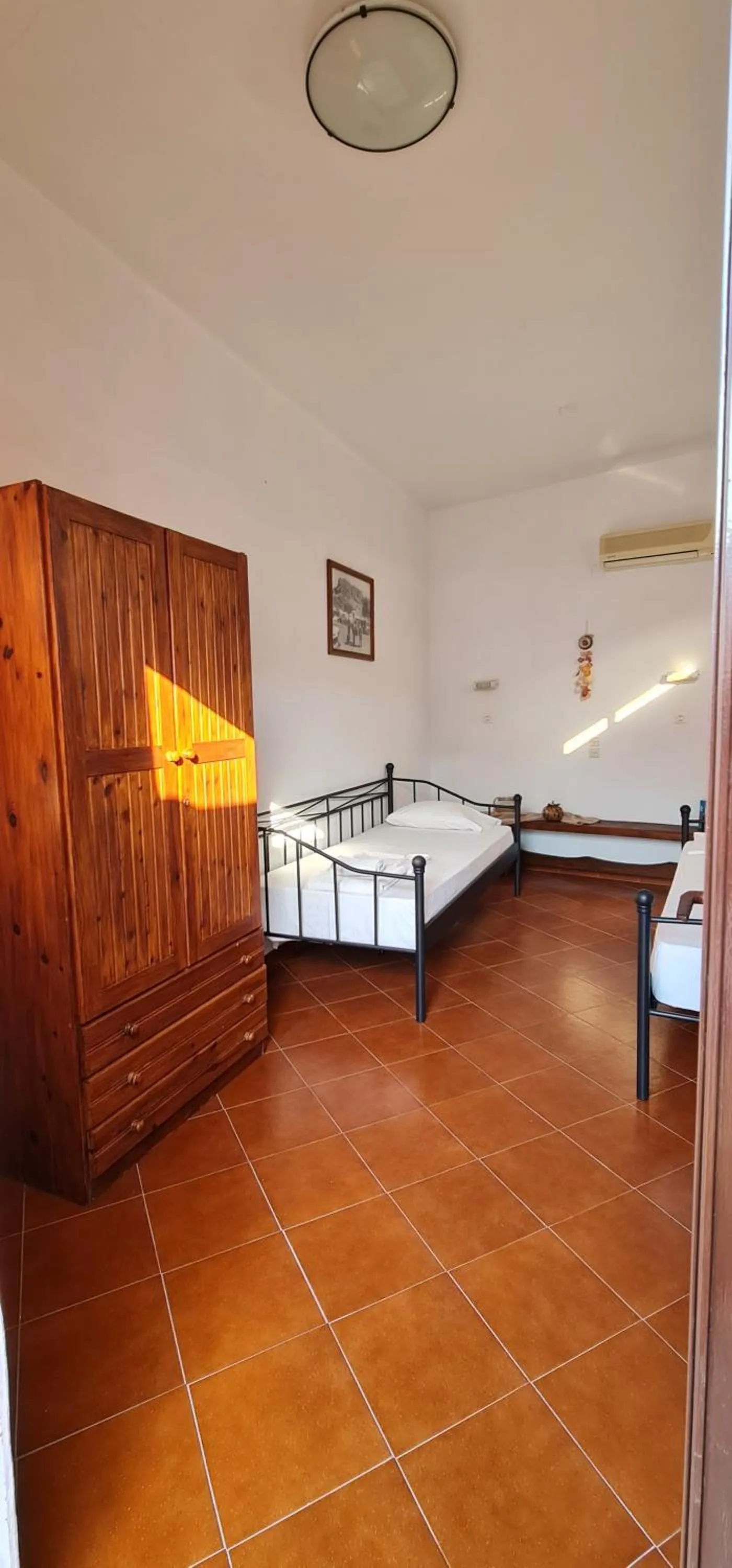 Property building, Bed in Lindos Center Studios