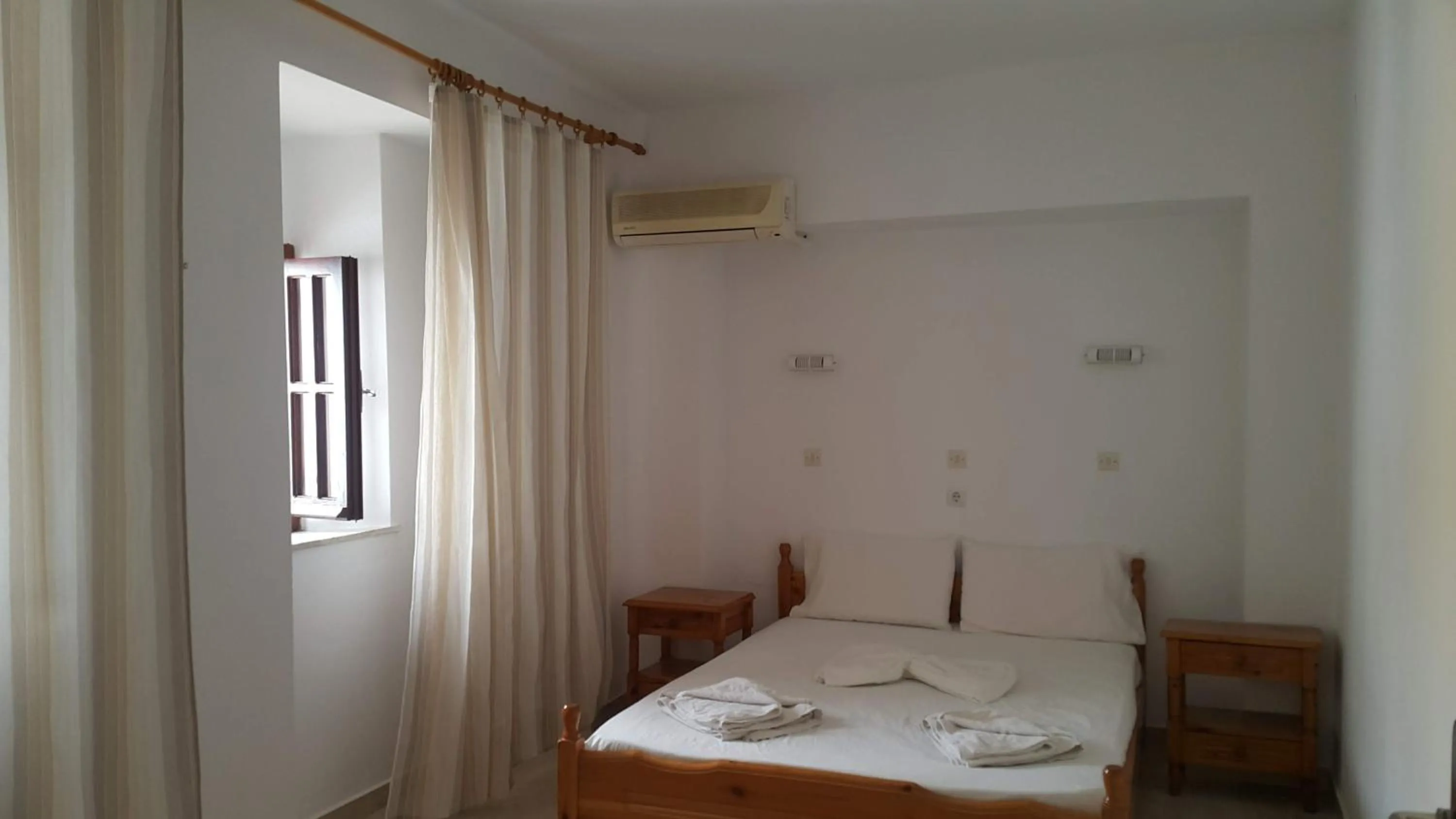 Photo of the whole room, Bed in Lindos Center Studios