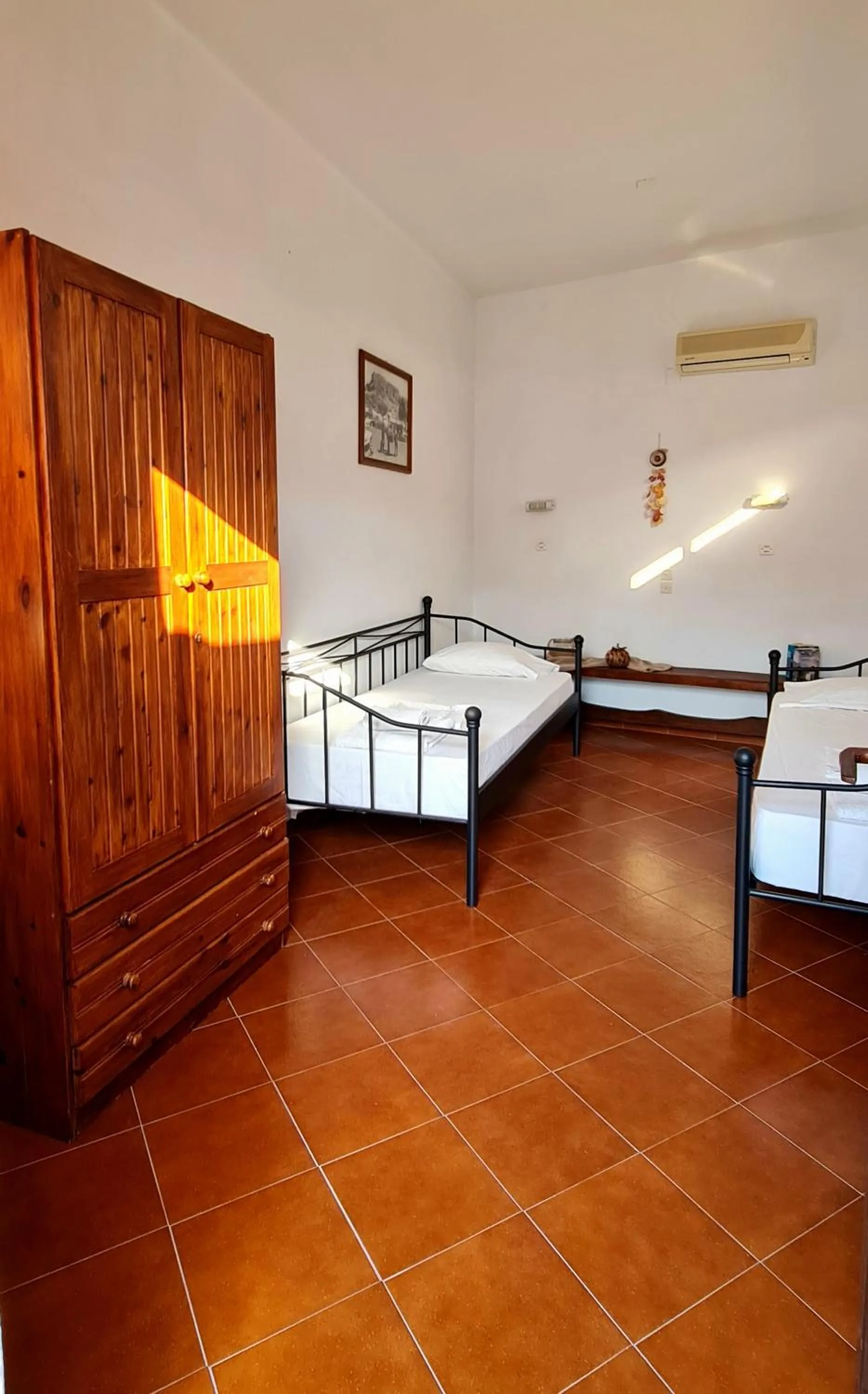Property building, Bed in Lindos Center Studios