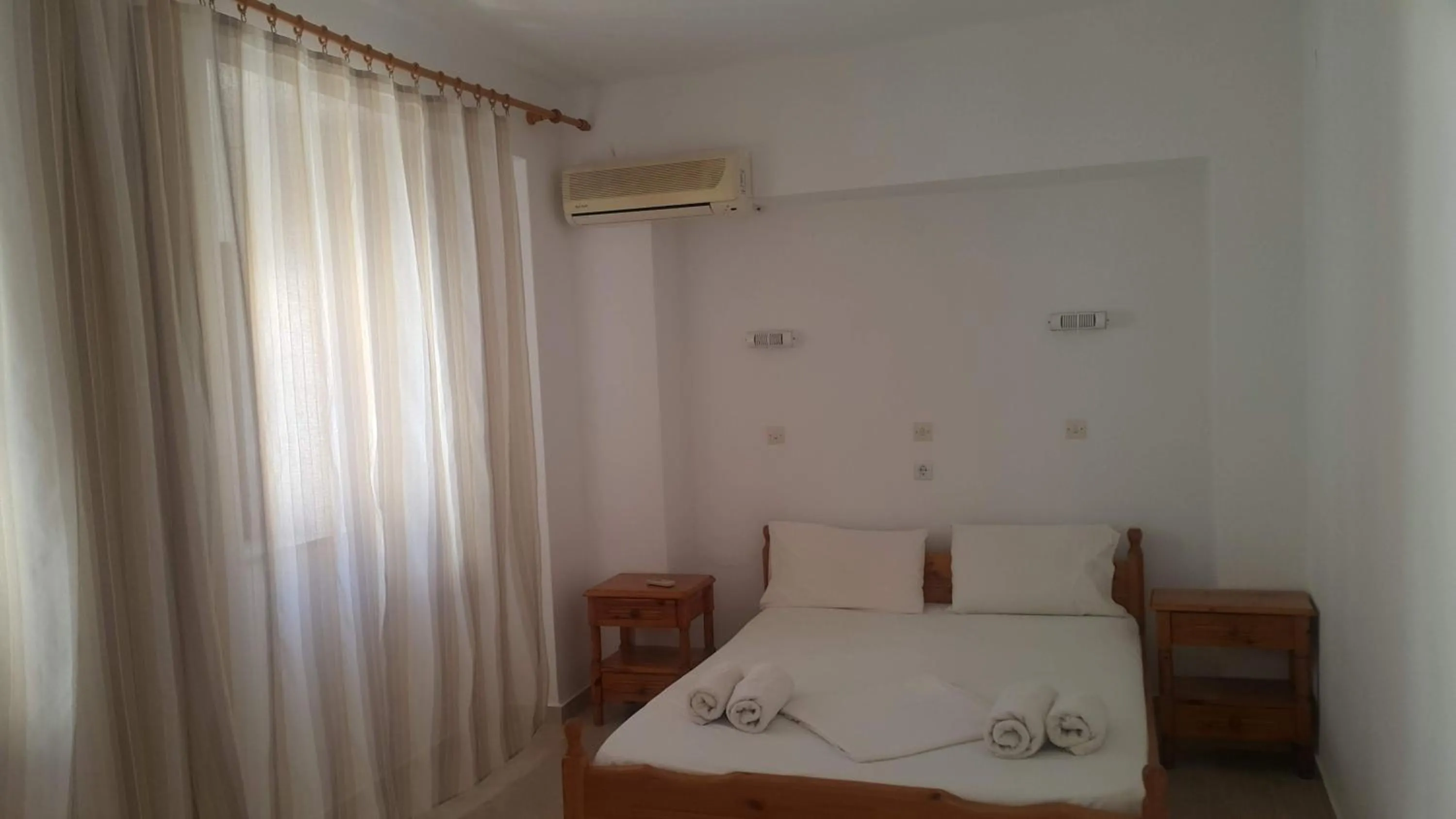 Photo of the whole room, Bed in Lindos Center Studios