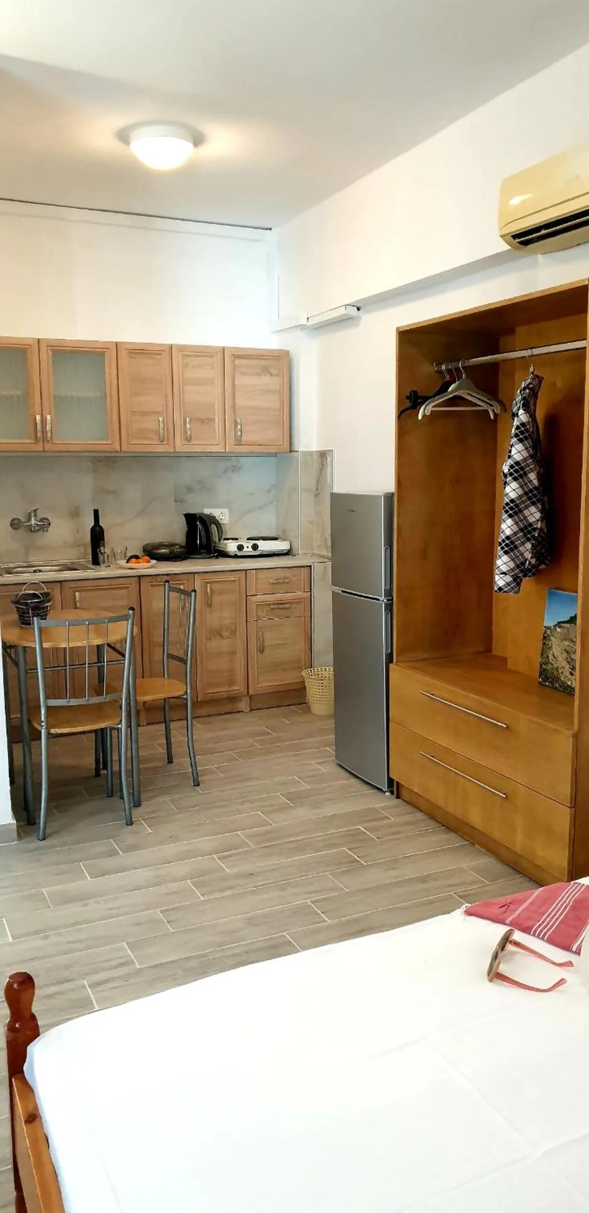 Dining area, Bed in Lindos Center Studios