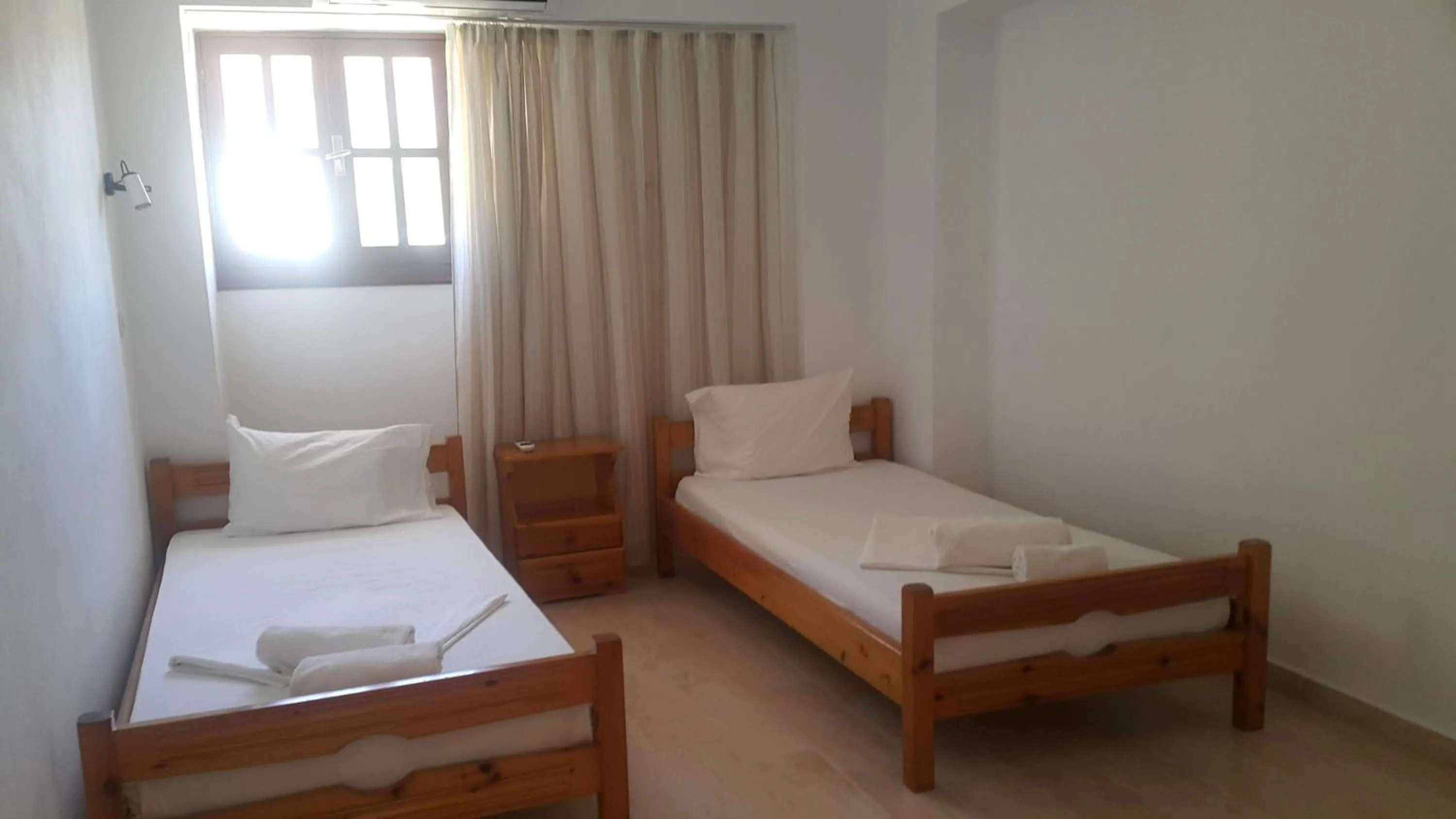 Photo of the whole room, Bed in Lindos Center Studios
