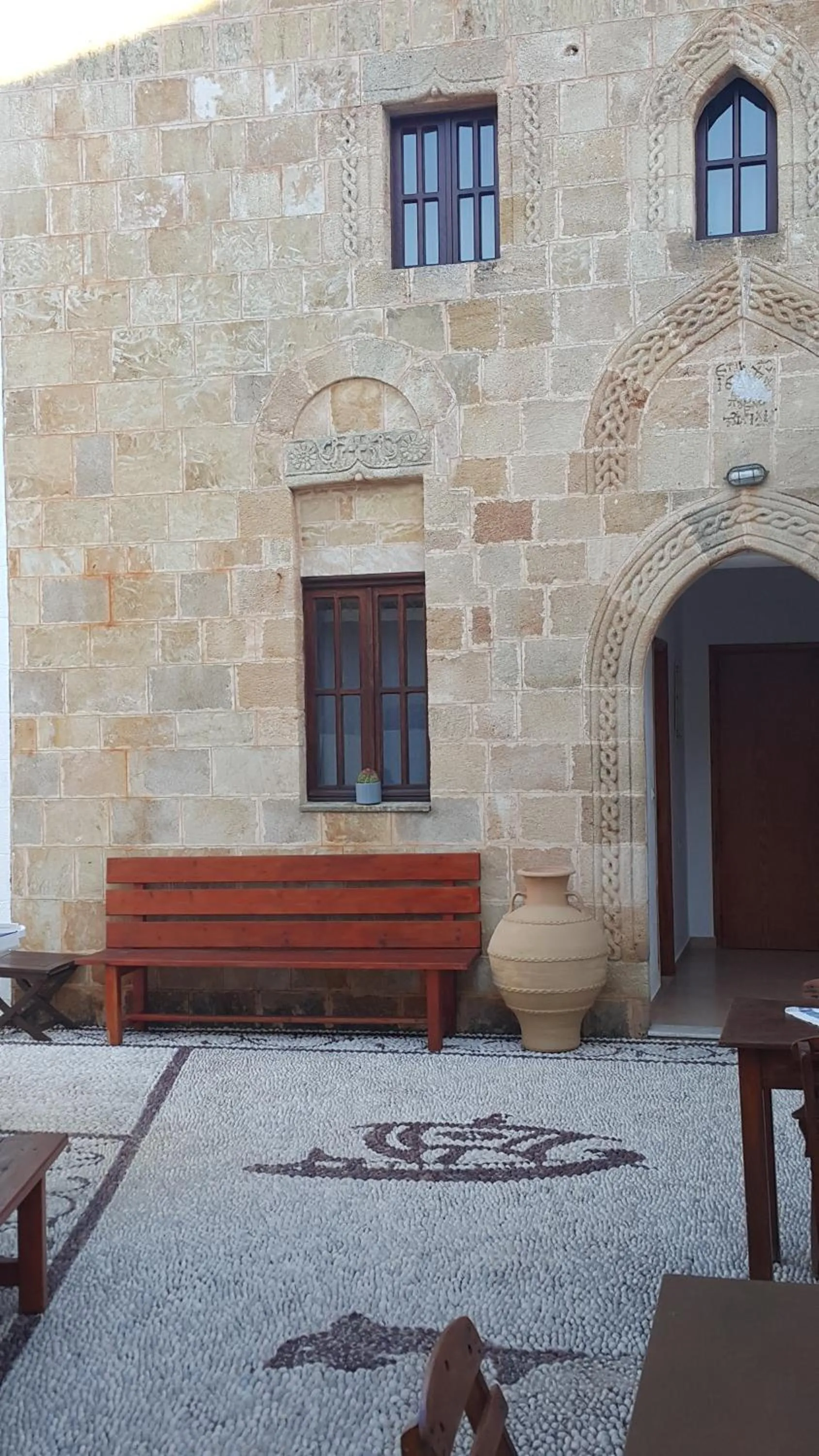 Facade/entrance in Lindos Center Studios