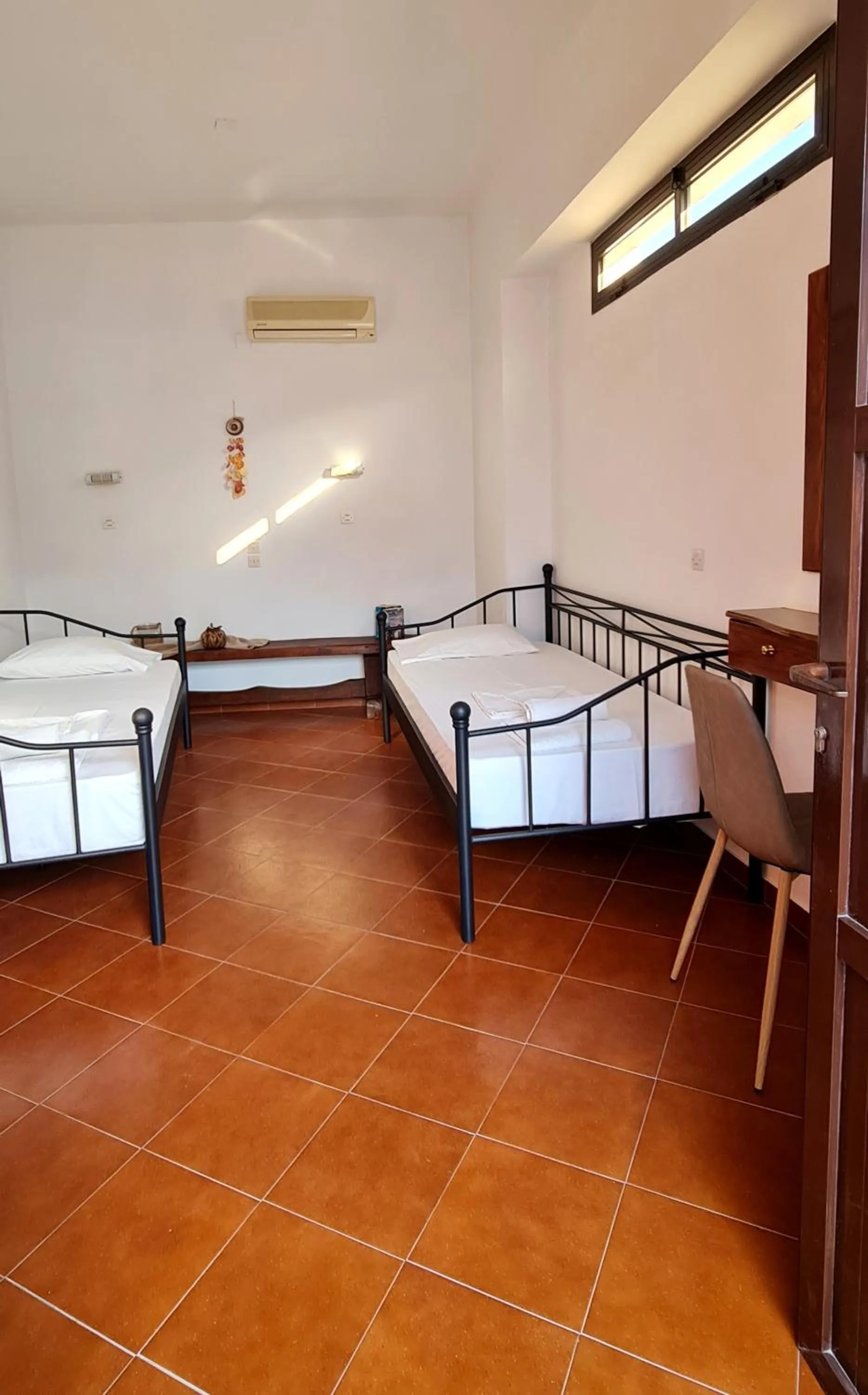 Property building, Bed in Lindos Center Studios