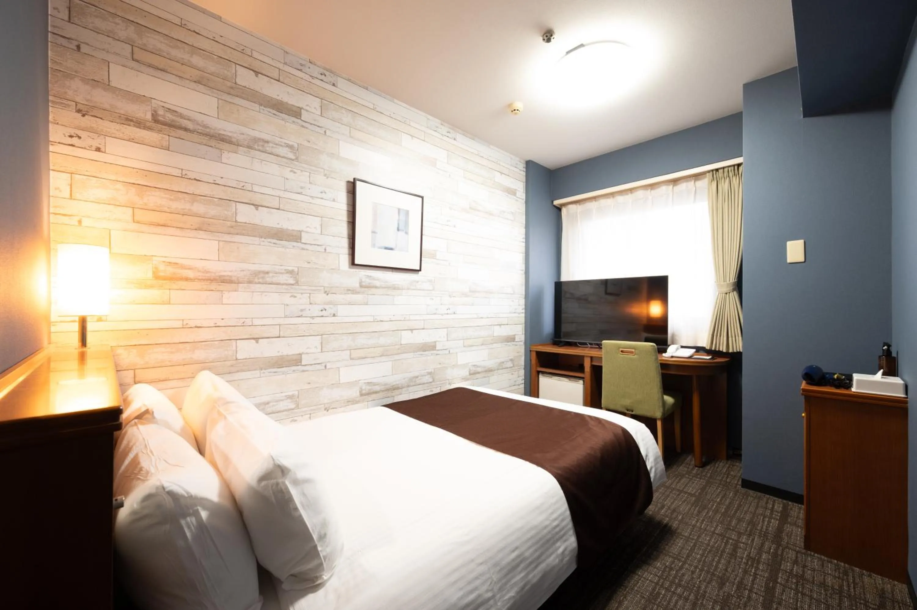 Bed in HOTEL THE7 Kumamoto