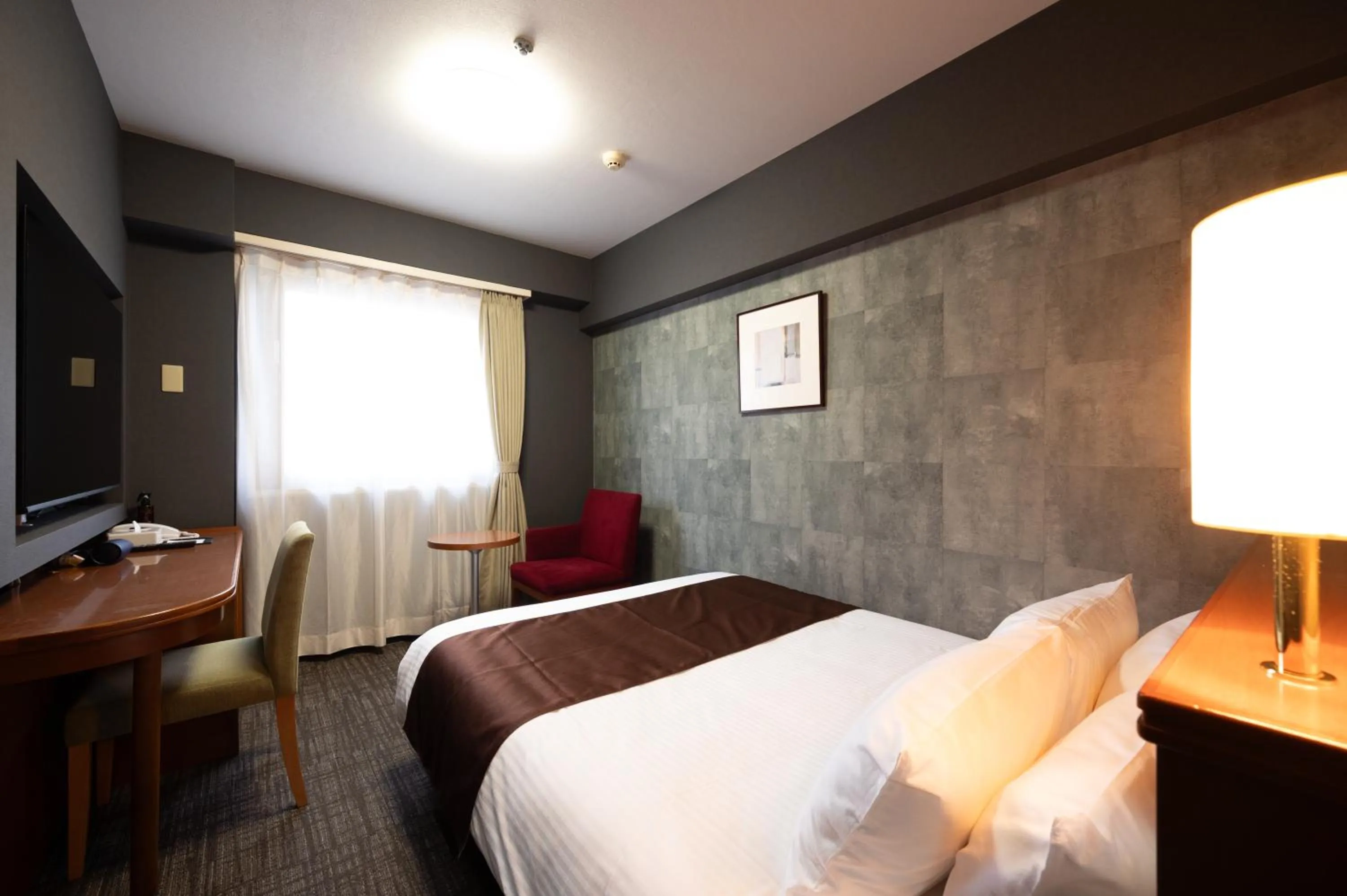 Bed in HOTEL THE7 Kumamoto