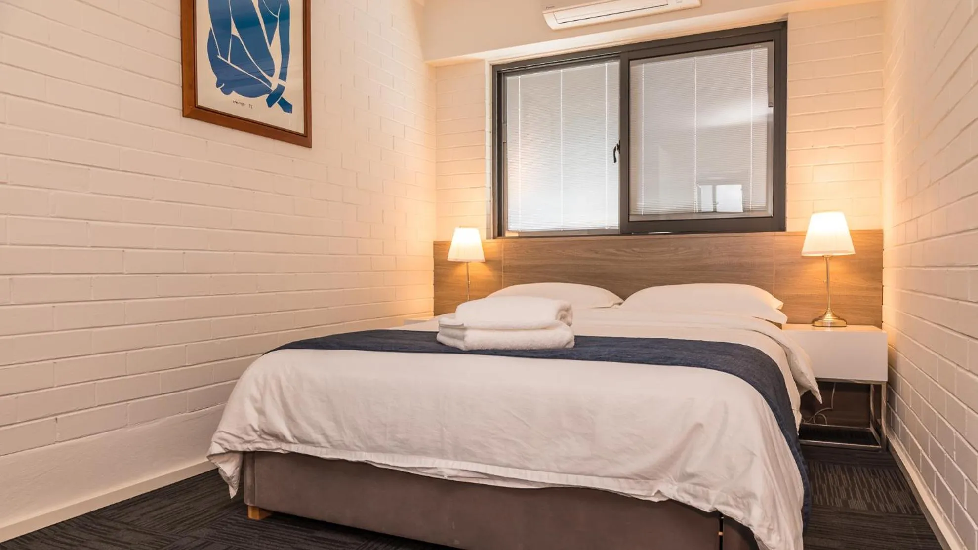 Bed in Batavia Apartments