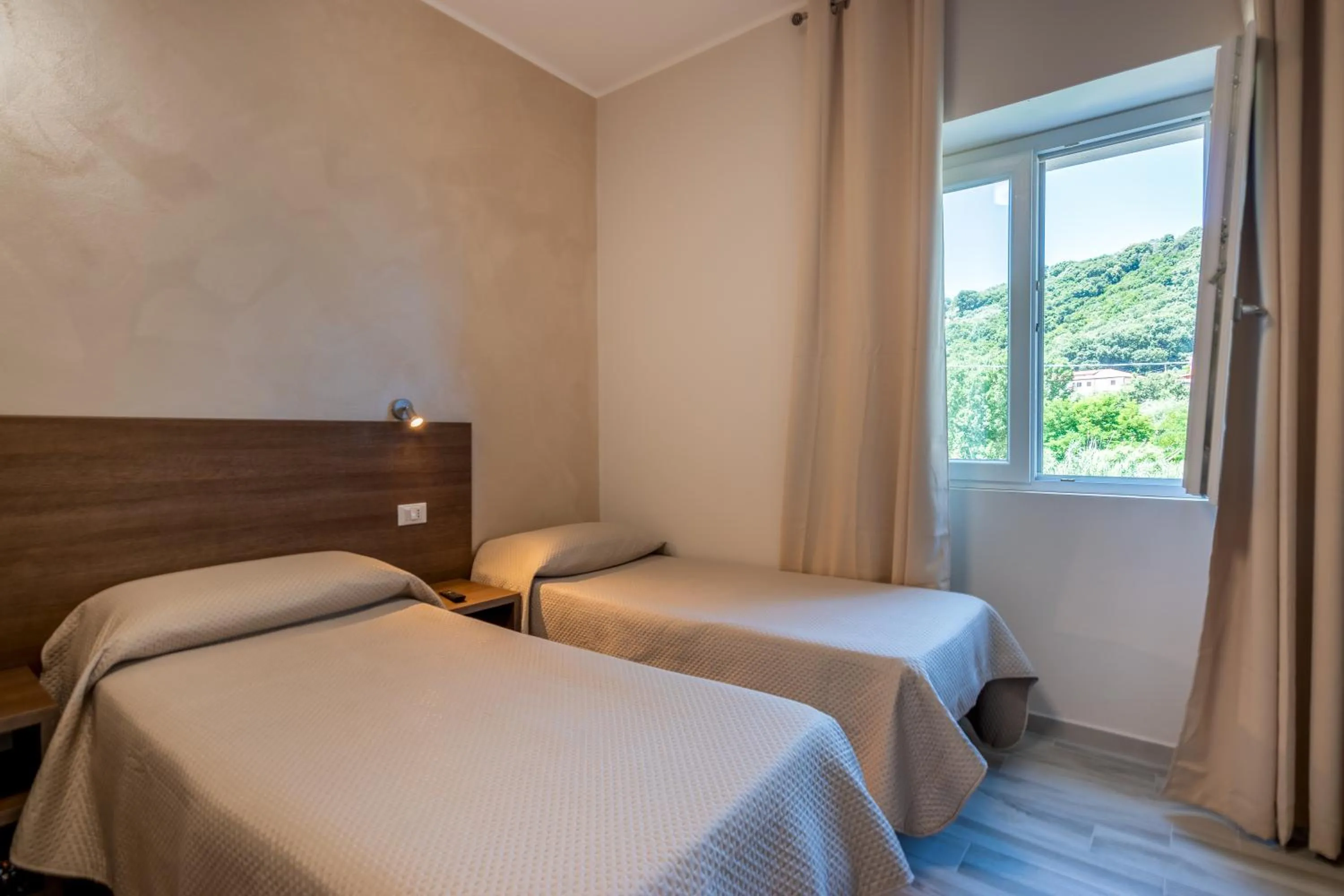 Bed in Hotel Ristorante La Mimosa