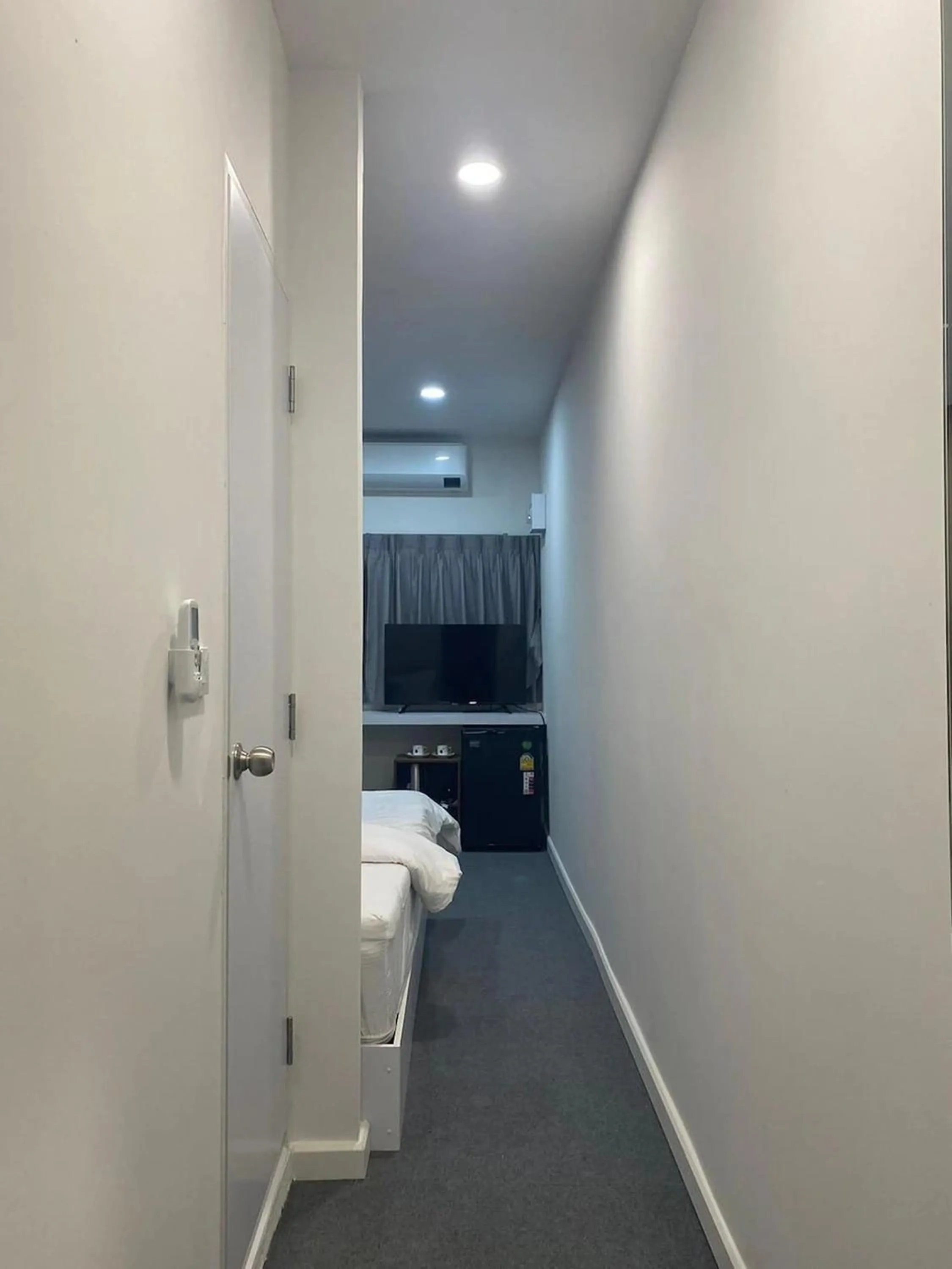 Bed in Nomads Homestay Sriracha