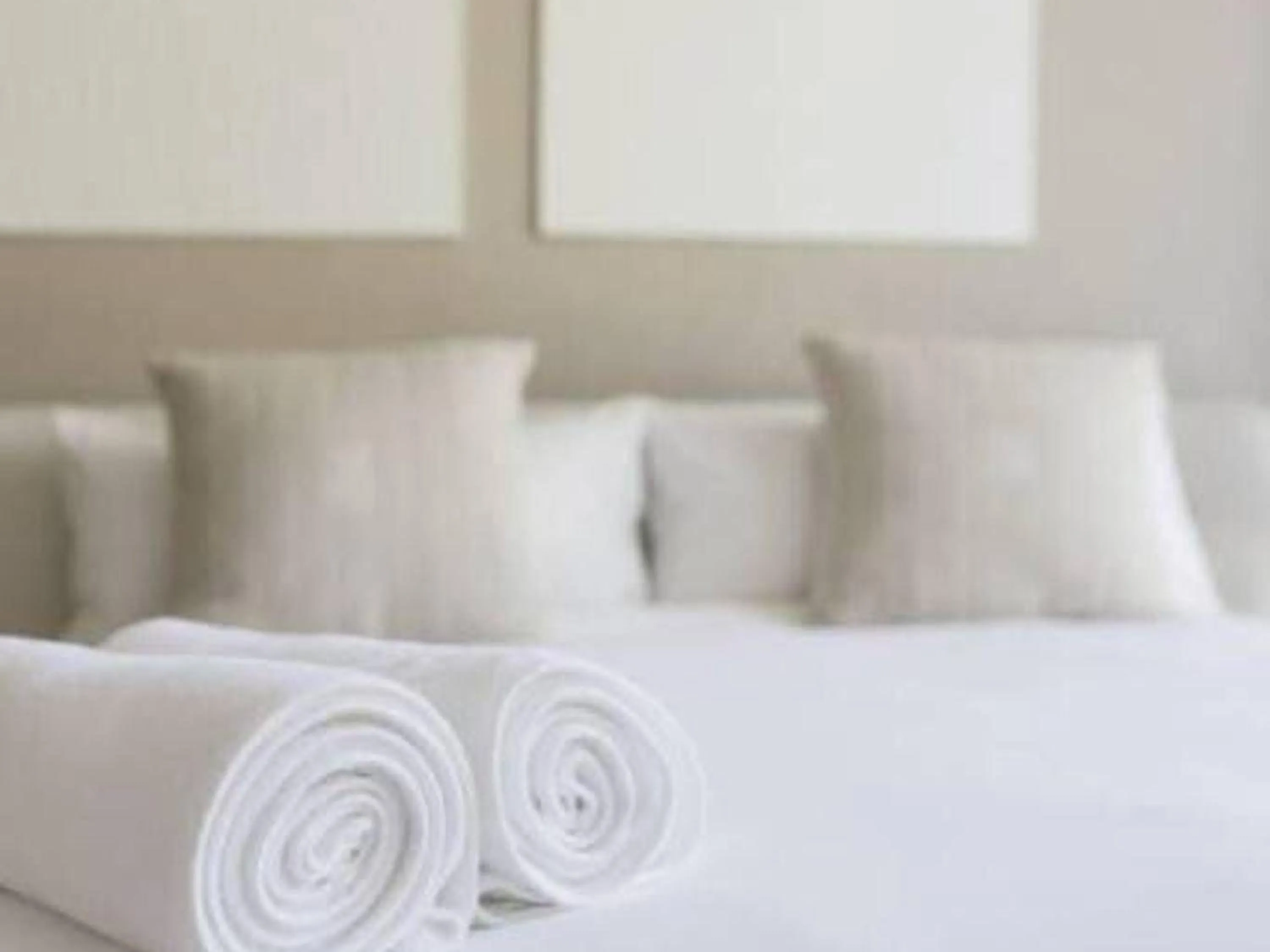 Bed in Nomads Homestay Sriracha