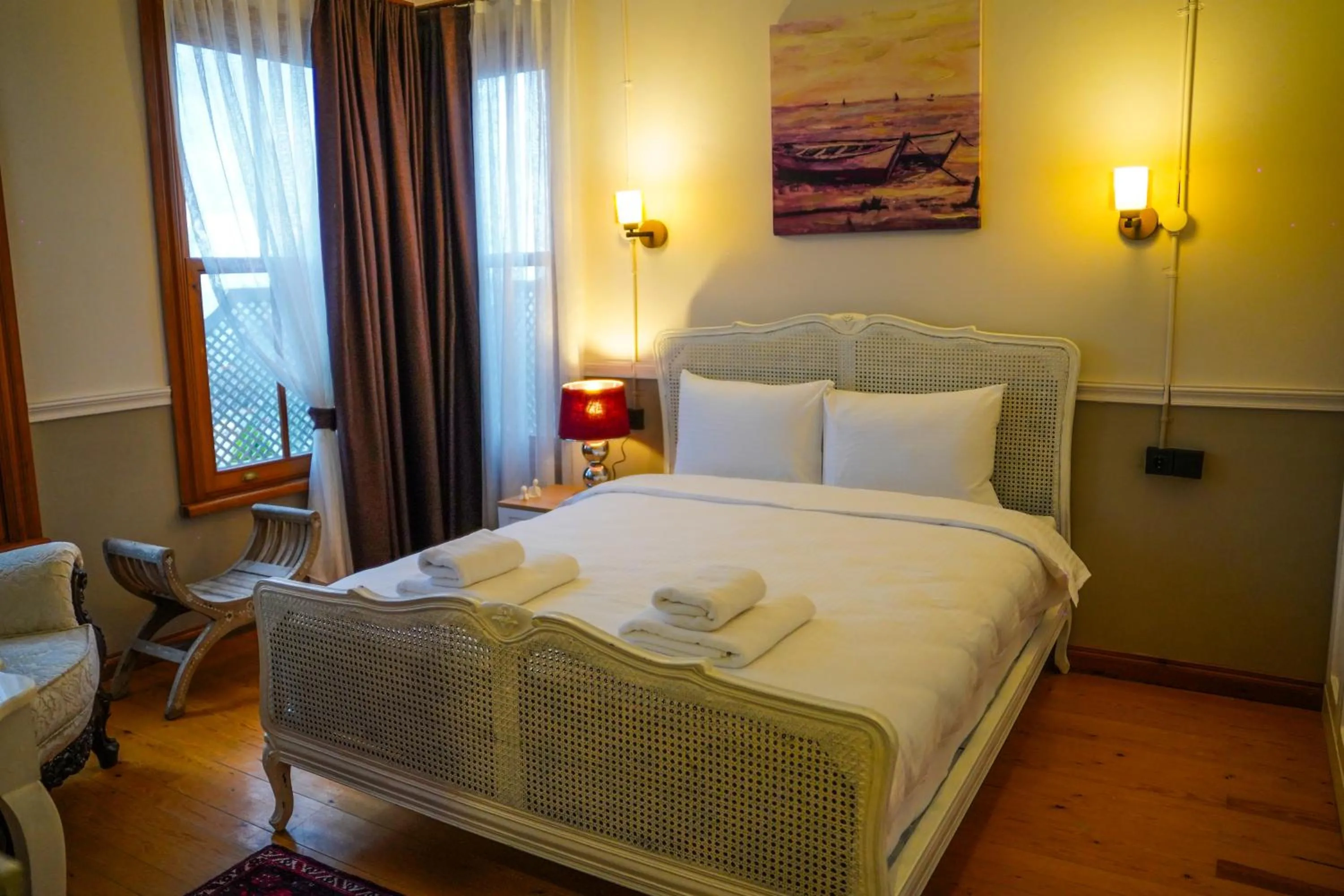 Bed in Leila Mansion Hotel