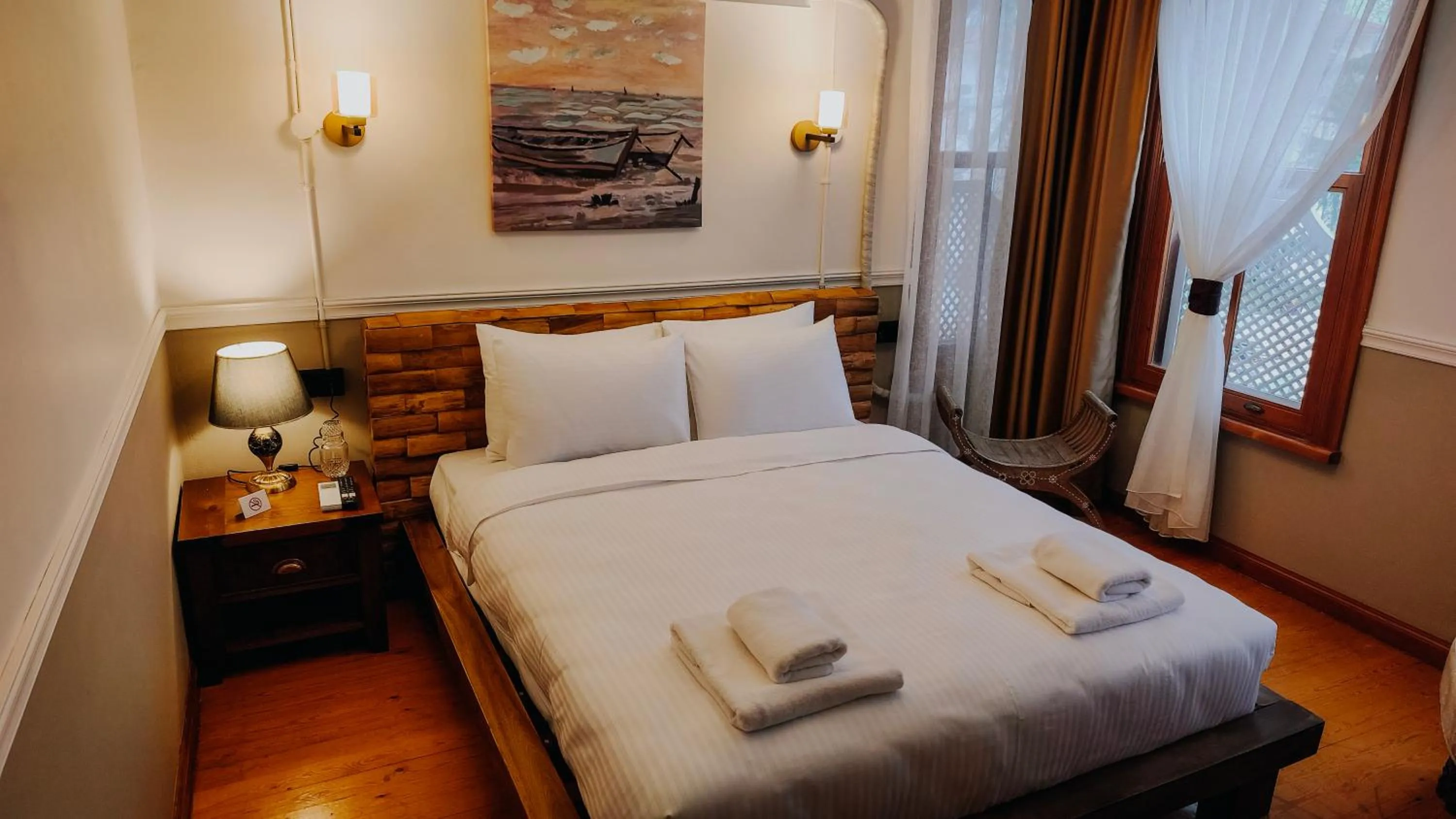 Bed in Leila Mansion Hotel