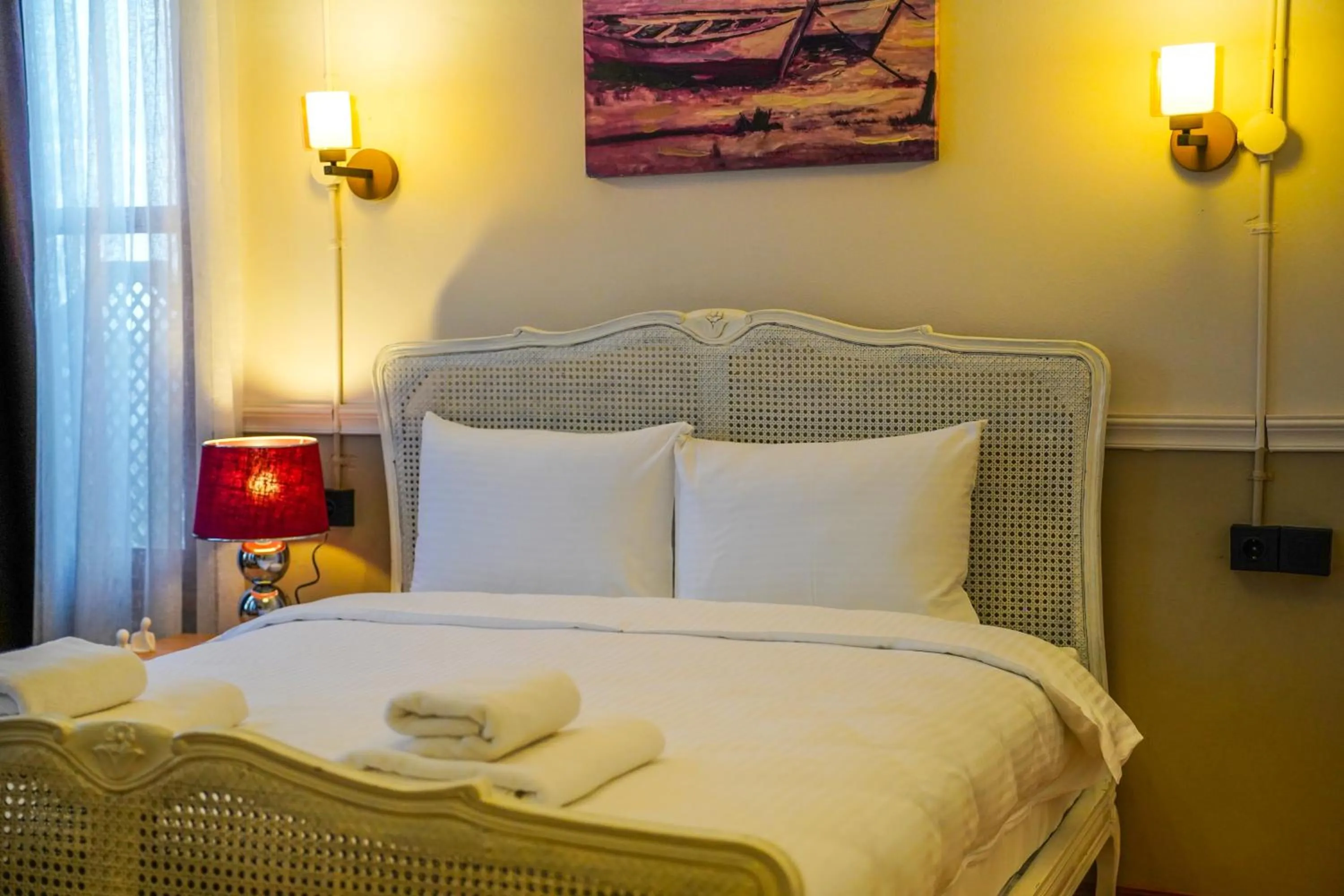 Bed in Leila Mansion Hotel