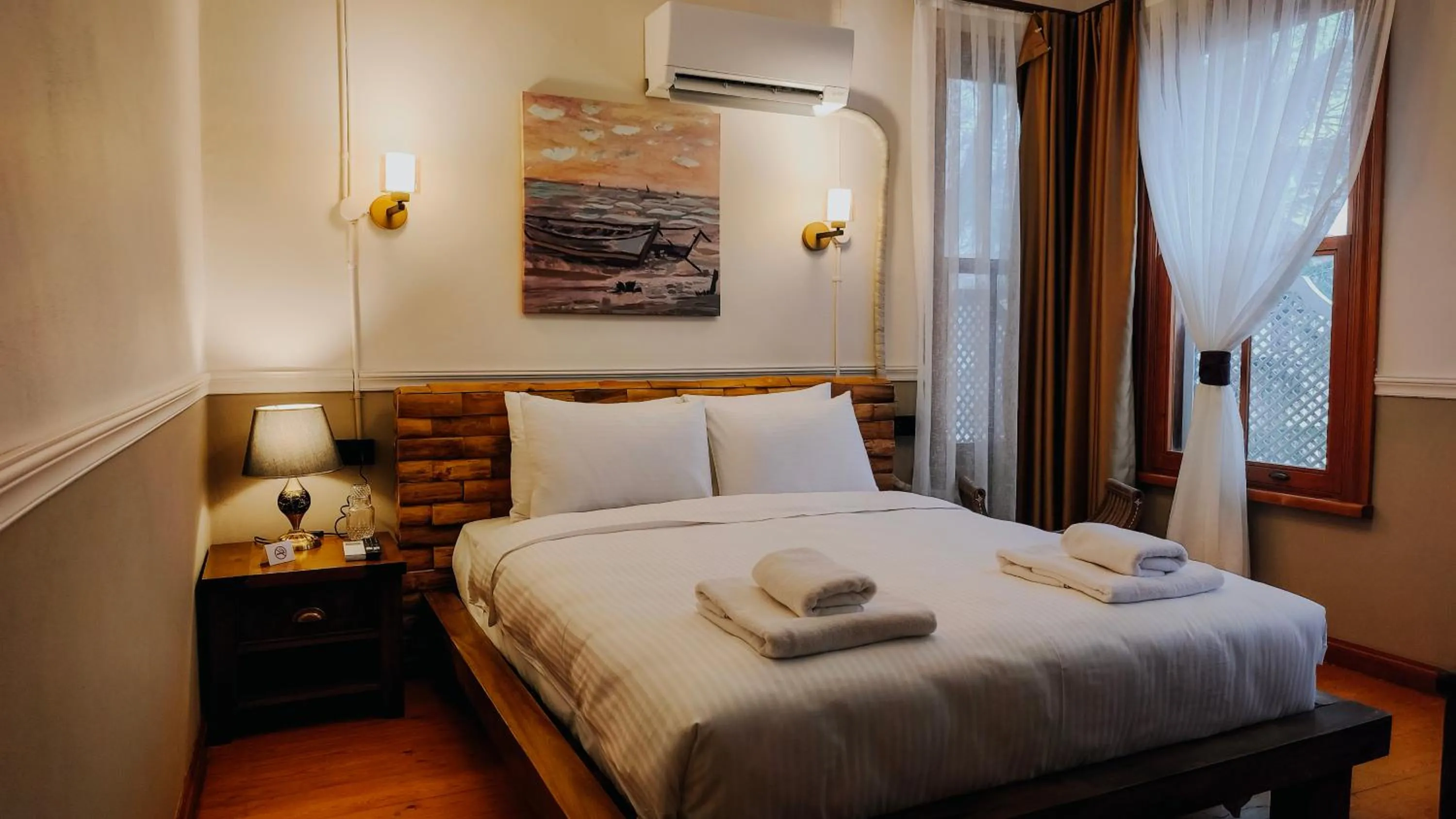 Bed in Leila Mansion Hotel