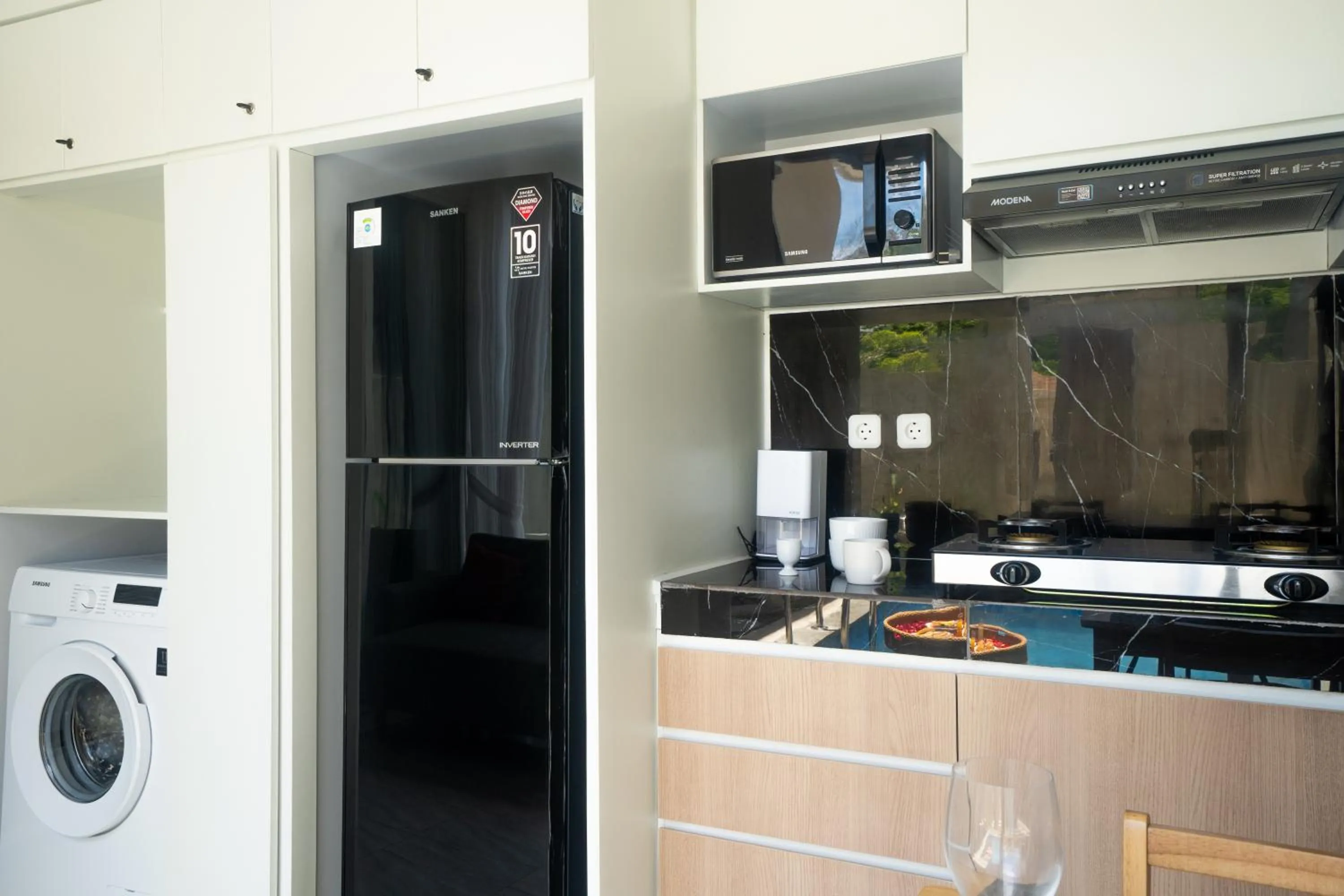 Kitchen or kitchenette in Otia Villa Nusa Dua by Premier Hospitality Asia