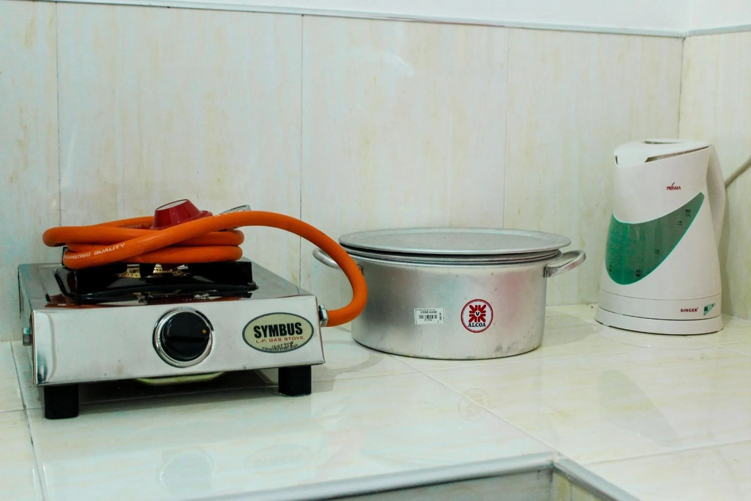 Kitchen or kitchenette in Orchid Rest