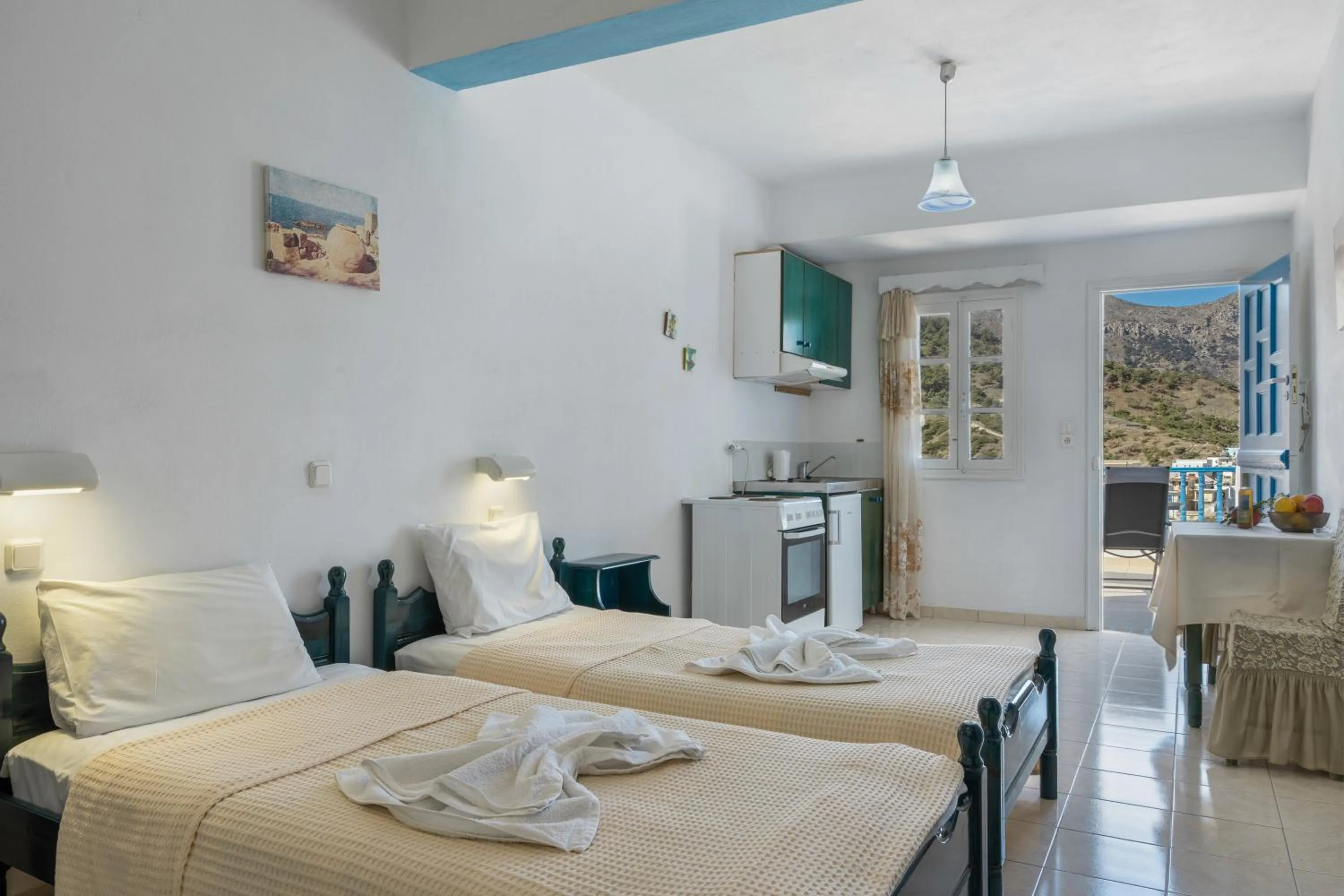 Property building, Bed in Hotel Glaros Karpathos