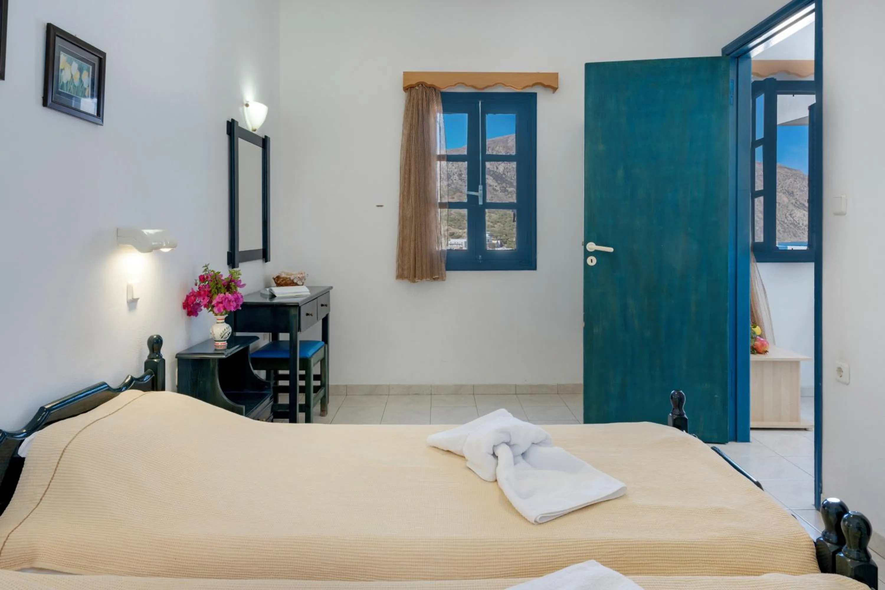 Living room, Bed in Hotel Glaros Karpathos