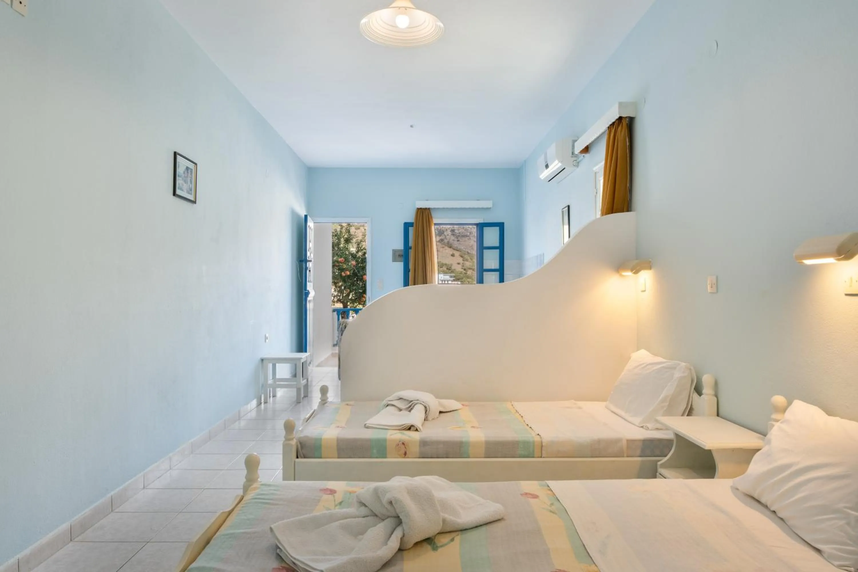 Property building, Bed in Hotel Glaros Karpathos