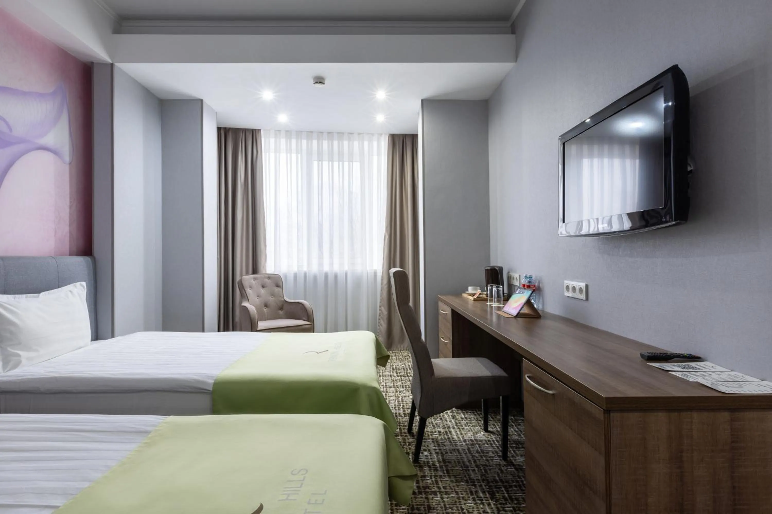 Bed in Renion Hills Hotel