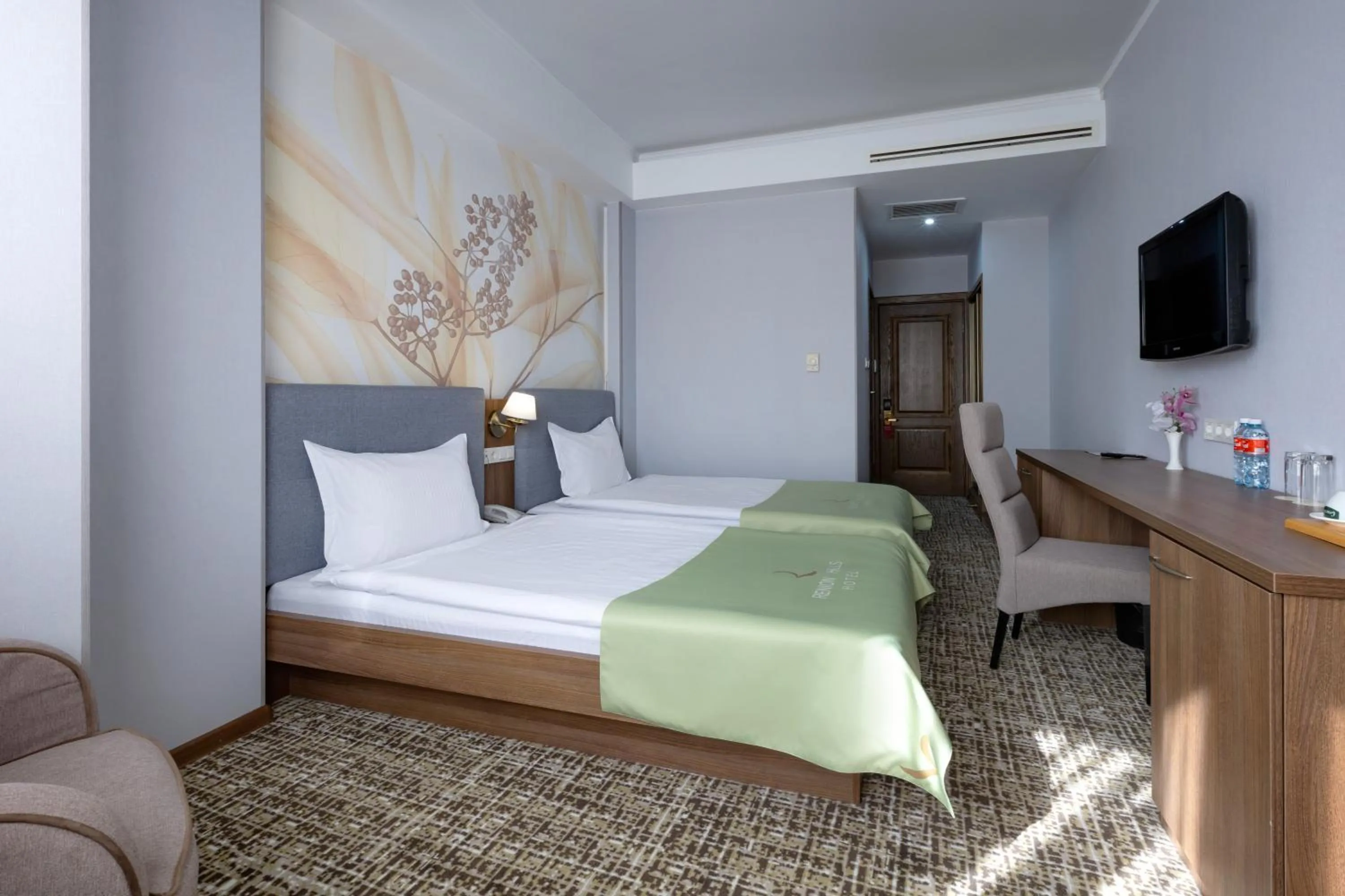 Bed in Renion Hills Hotel