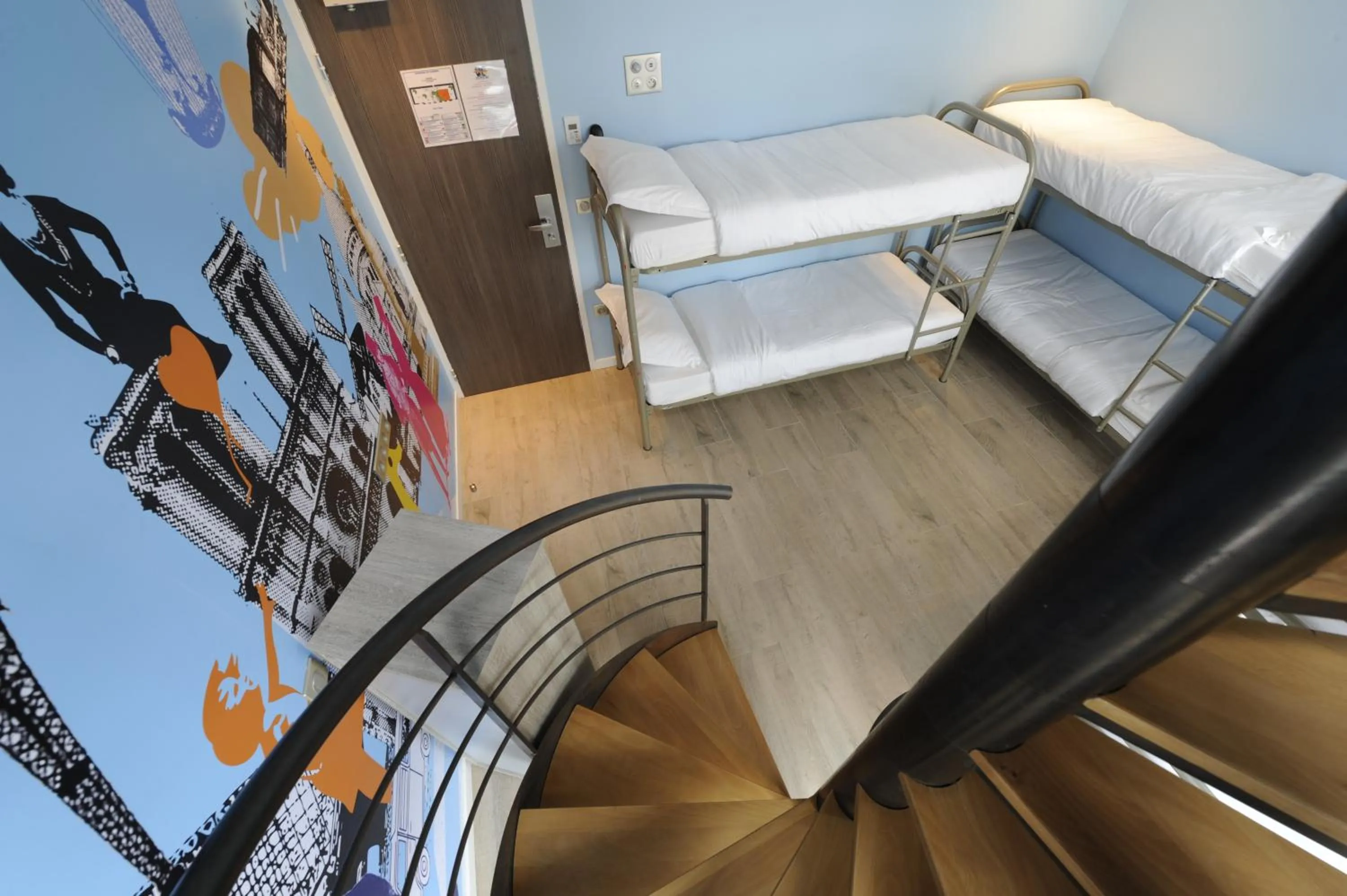 Photo of the whole room in The 3 Ducks Eiffel Tower by Hiphophostels
