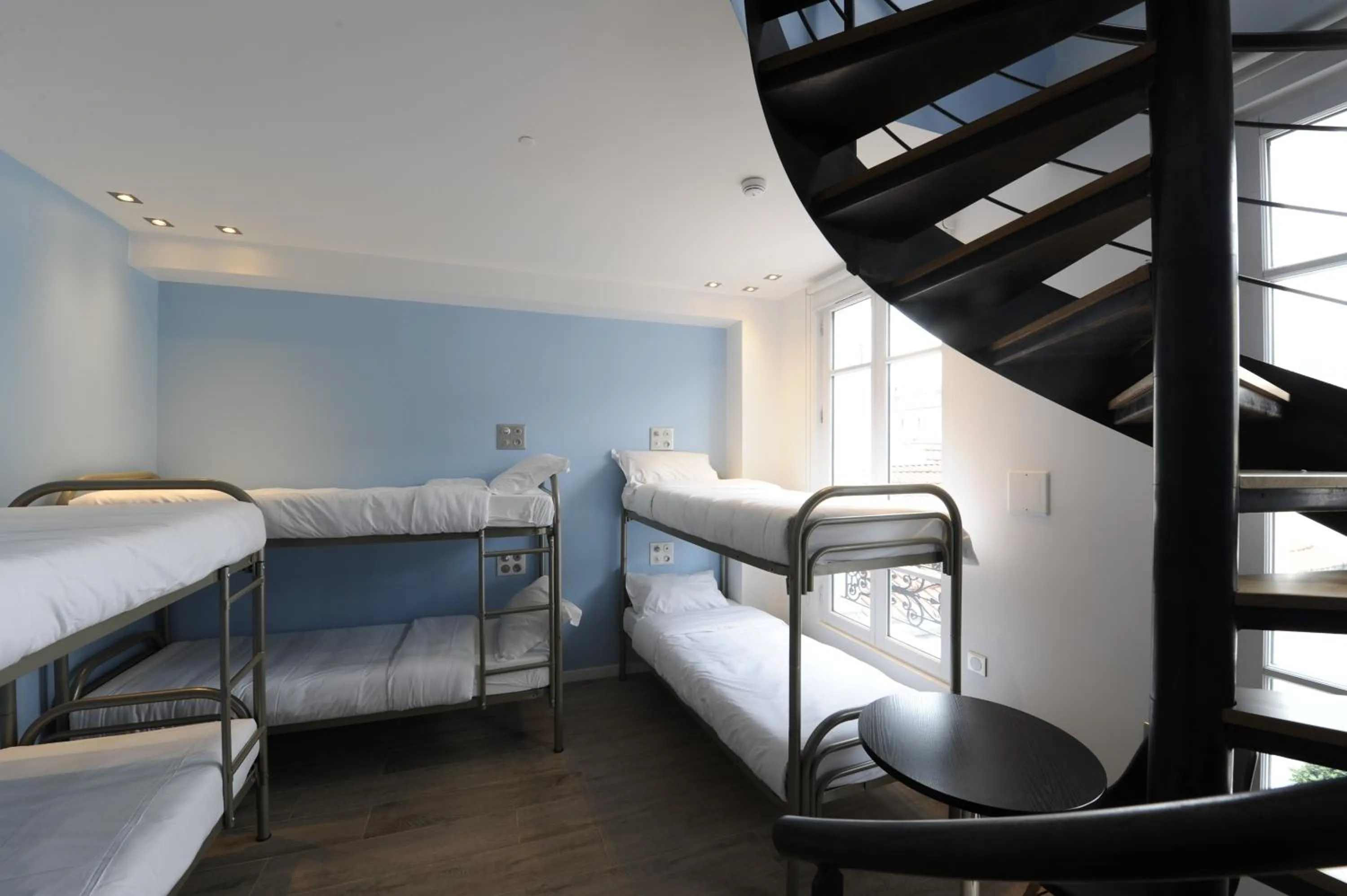 Photo of the whole room, Bed in The 3 Ducks Eiffel Tower by Hiphophostels