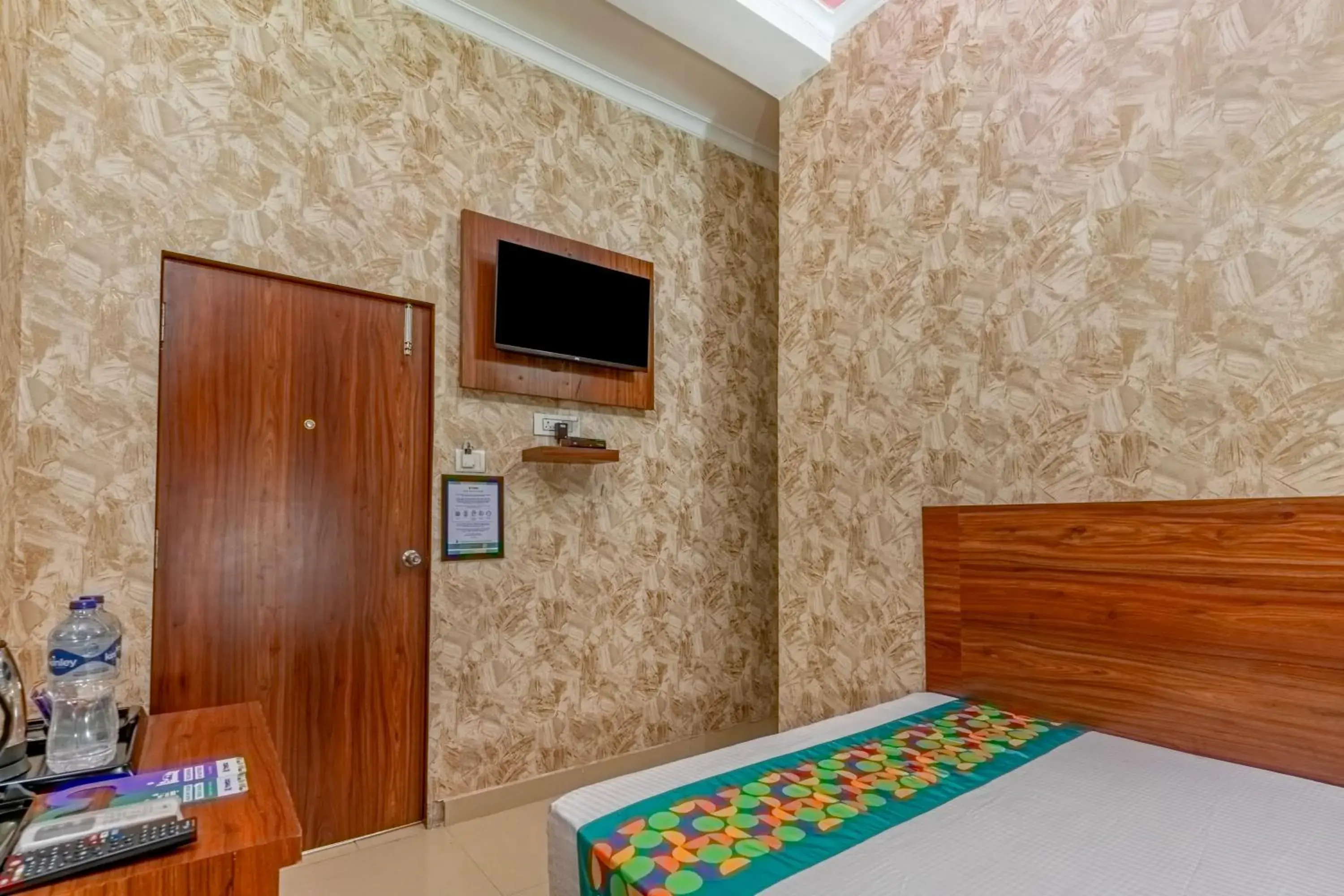 Bedroom, Bed in Treebo Una Regency - Near AIIMS Patna Bedroom, Bed in Treebo Una Regency - Near AIIMS Patna