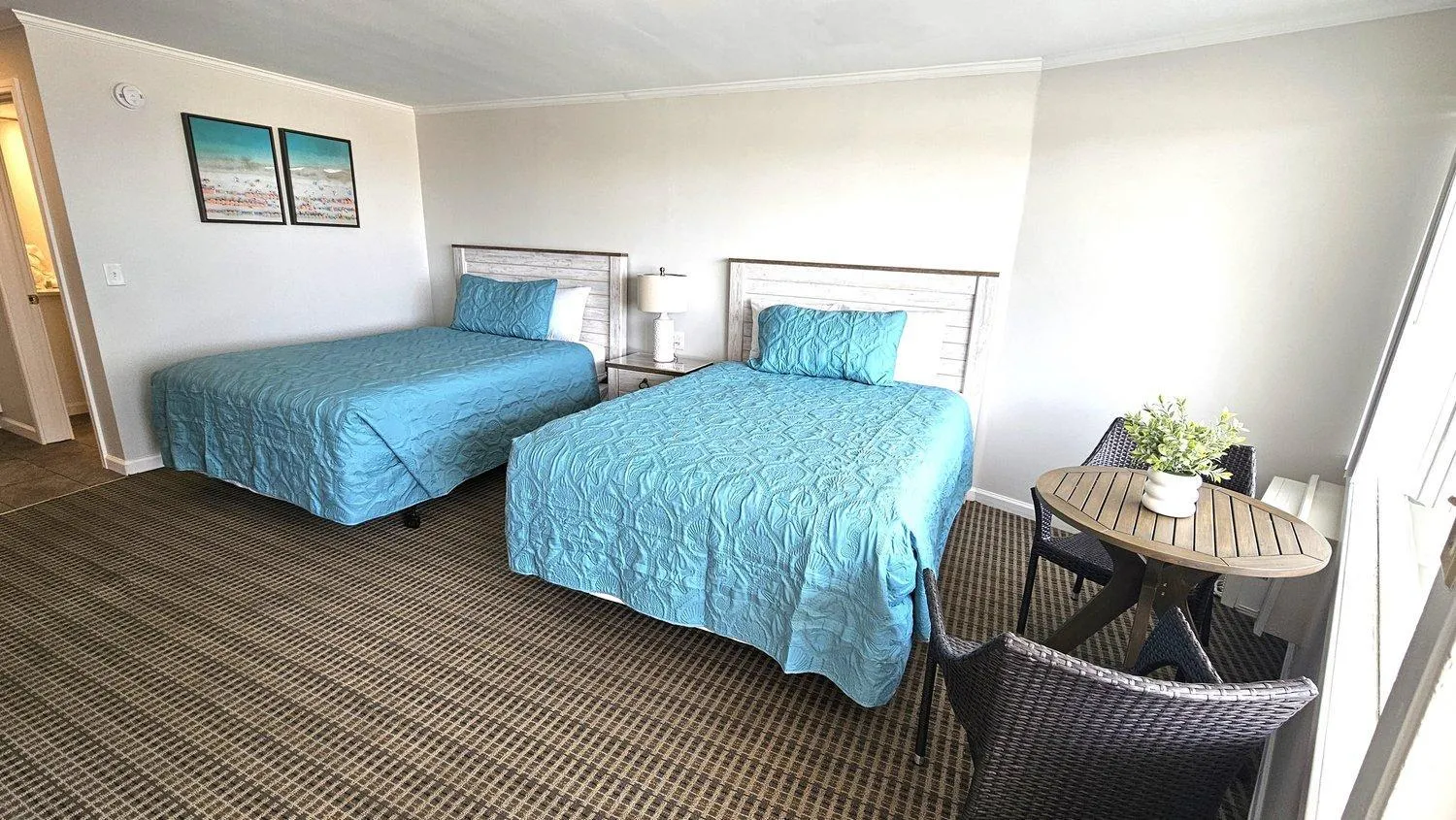 Bed in Aqua Beach Hotel