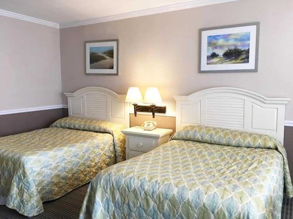 Bed in Aqua Beach Hotel