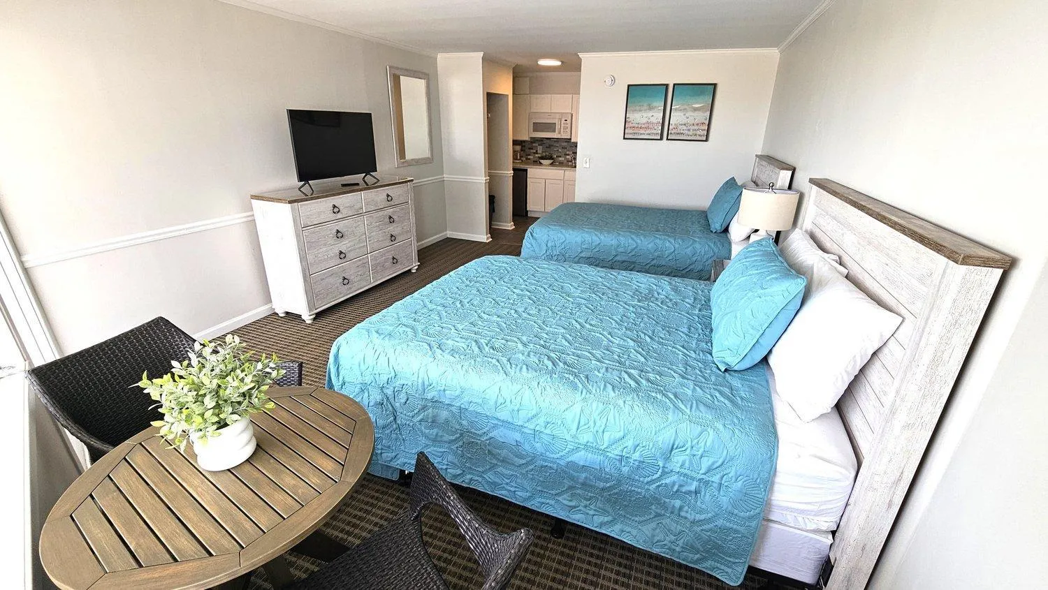 Bed in Aqua Beach Hotel