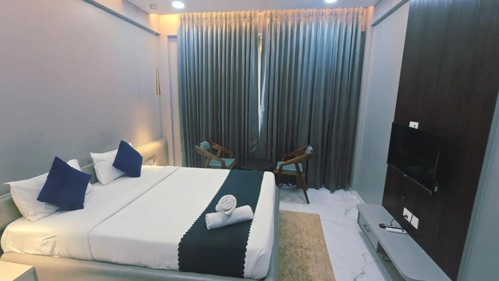Bedroom, Bed in Hotel Laxmi Elite Karad