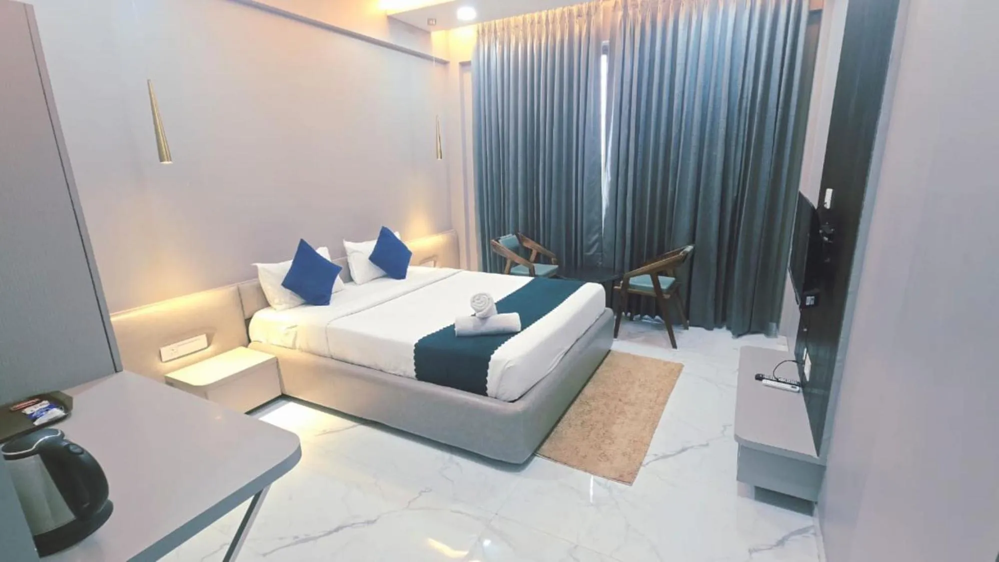 Bed in Hotel Laxmi Elite Karad