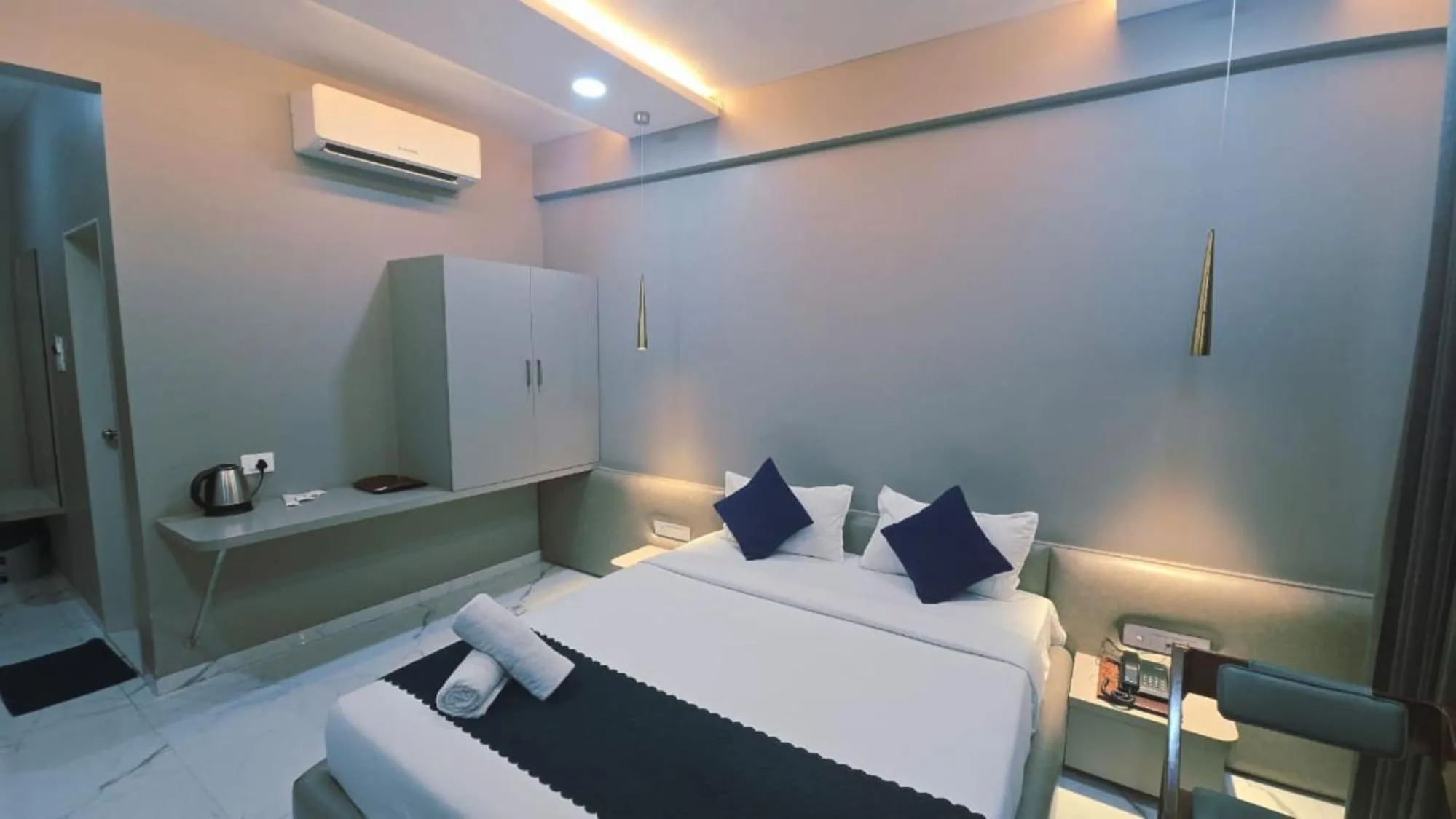 Bed in Hotel Laxmi Elite Karad