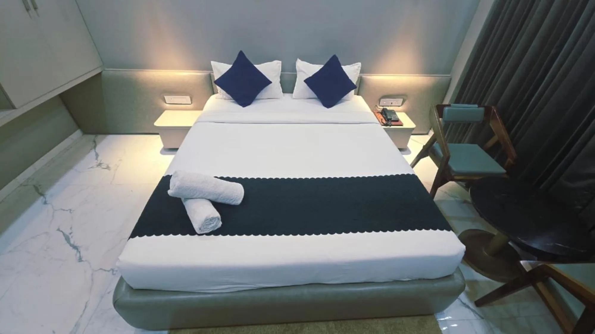 Bed in Hotel Laxmi Elite Karad