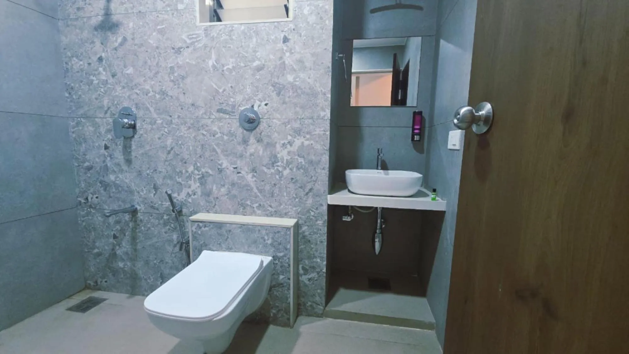 Toilet in Hotel Laxmi Elite Karad