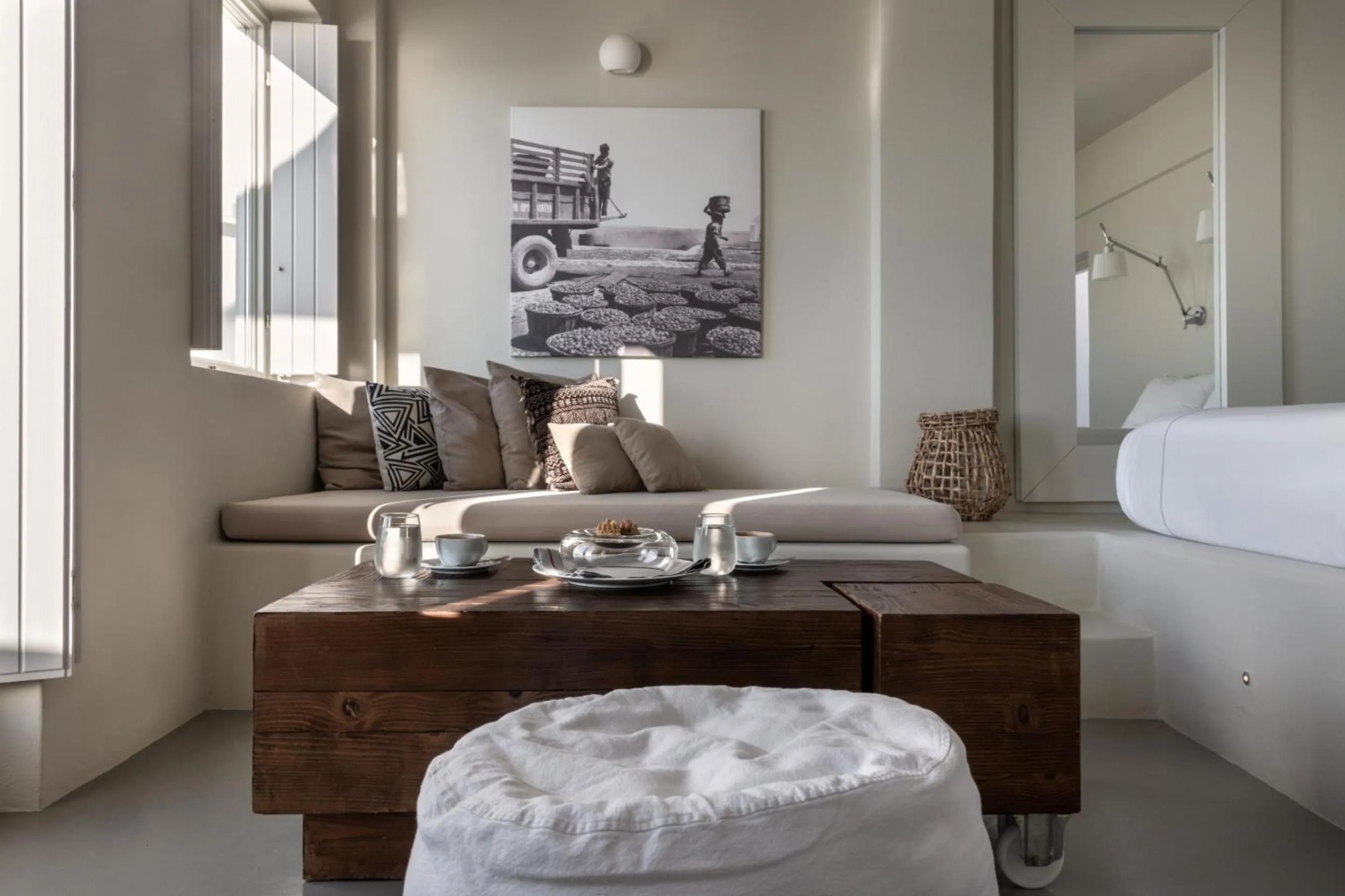 Seating area, Bed in West East Suites