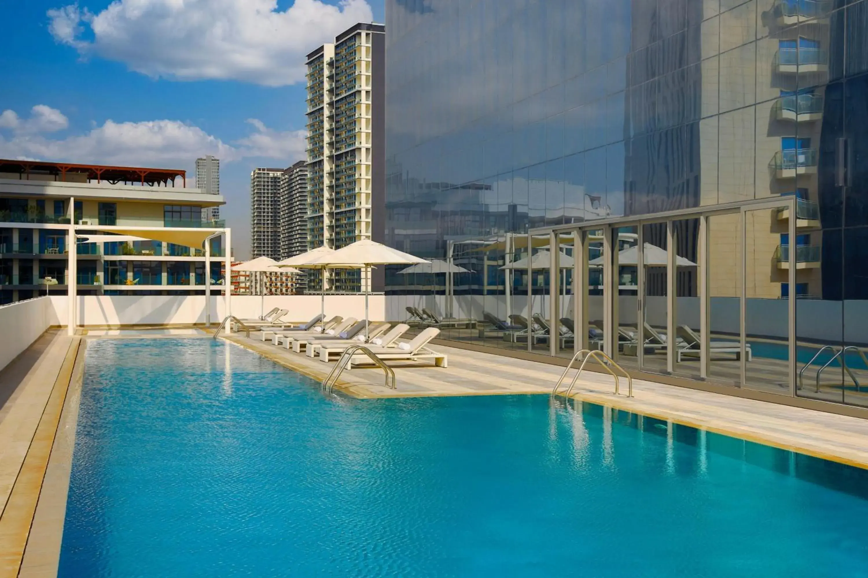 Swimming pool in Hotel Local Dubai, Jumeirah Village Triangle, Autograph Collection Swimming pool in Hotel Local Dubai, Jumeirah Village Triangle, Autograph Collection